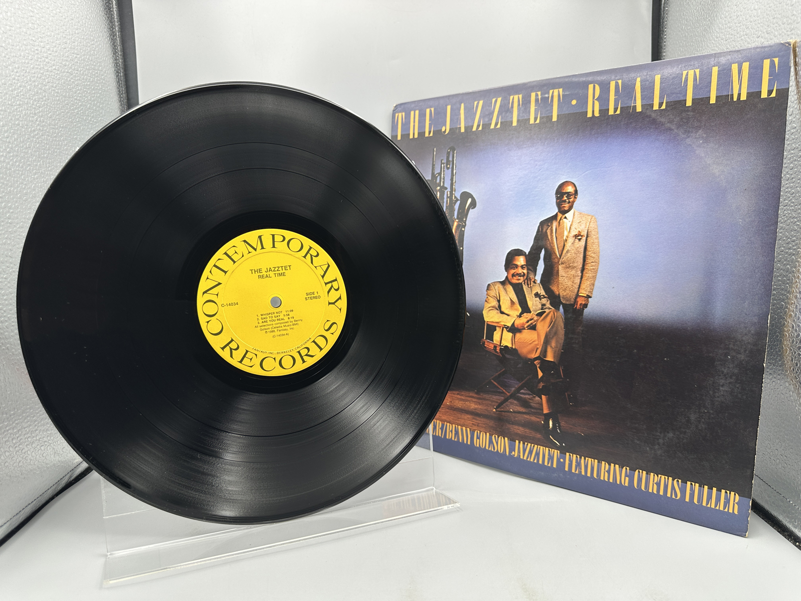The Jazztet: Real Time (1988), promo stamp on back cover. The Jazztet includes Art Farmer and Benny Golson & features Curtis Fuller.