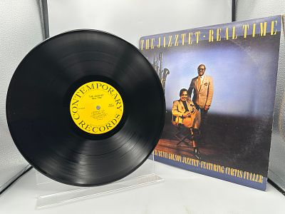 The Jazztet: Real Time (1988), promo stamp on back cover. The Jazztet includes Art Farmer and 