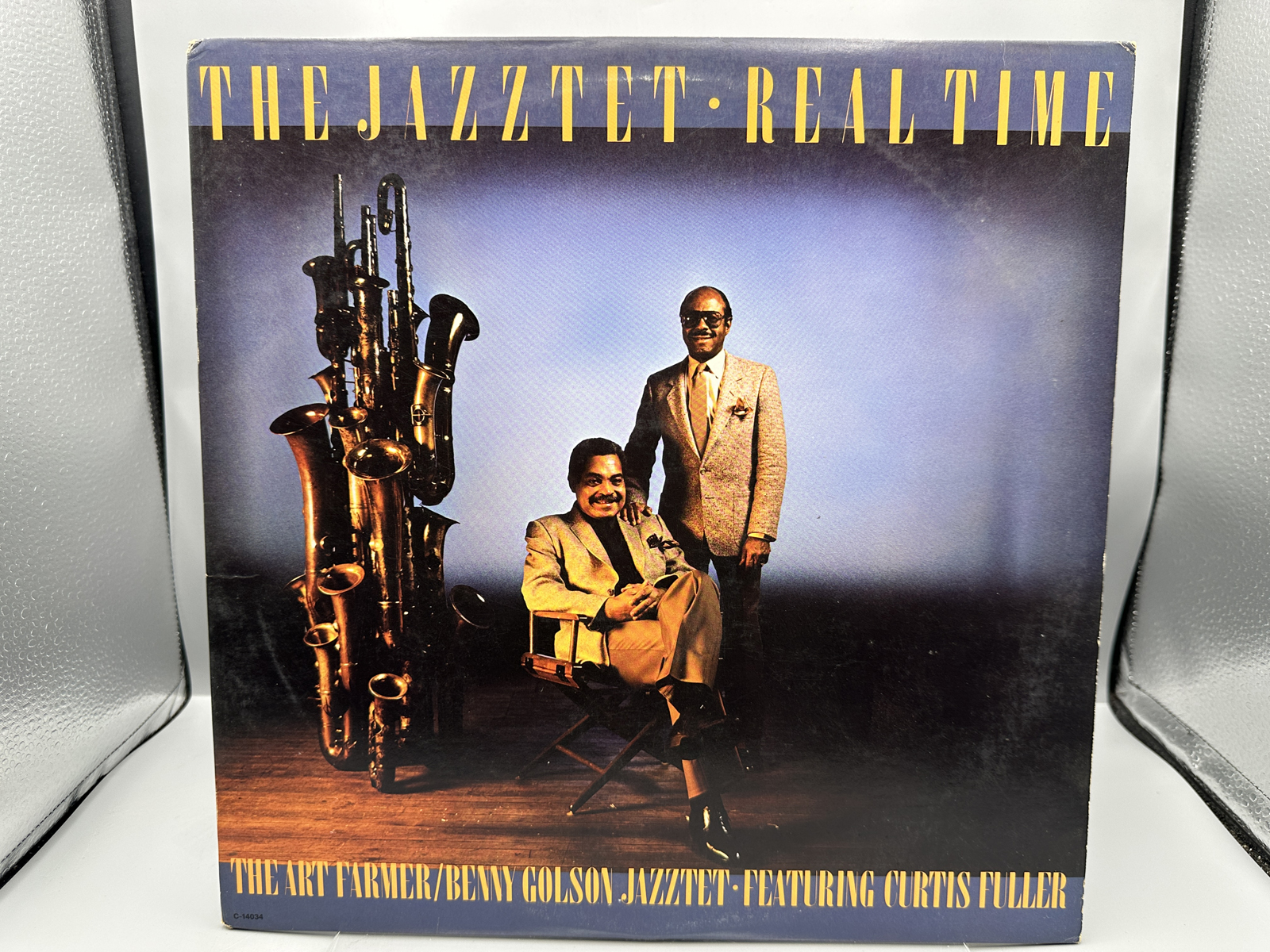 The Jazztet: Real Time (1988), promo stamp on back cover. The Jazztet includes Art Farmer and Benny Golson & features Curtis Fuller.