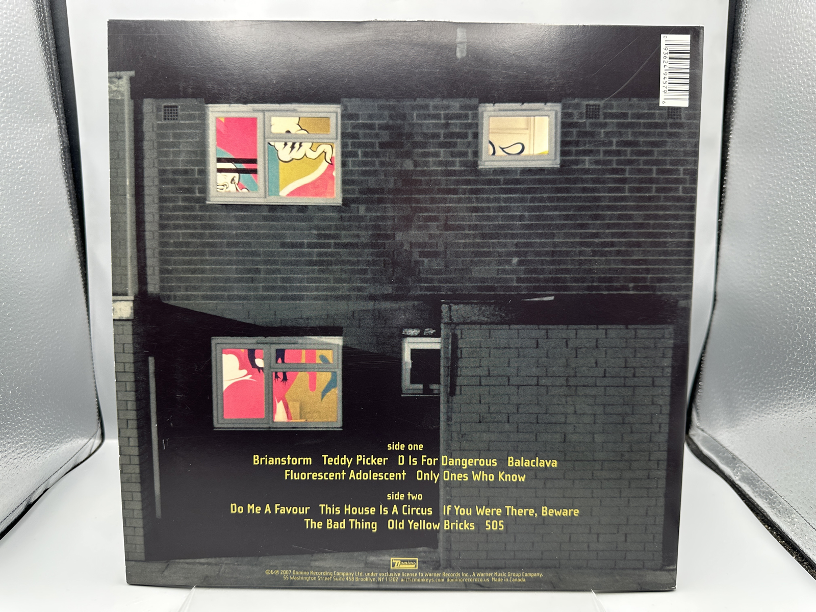 Arctic Monkeys: Favorite Worst Nightmare (2013), reissue, gatefold, minor 2-inch tear in cover's top seam