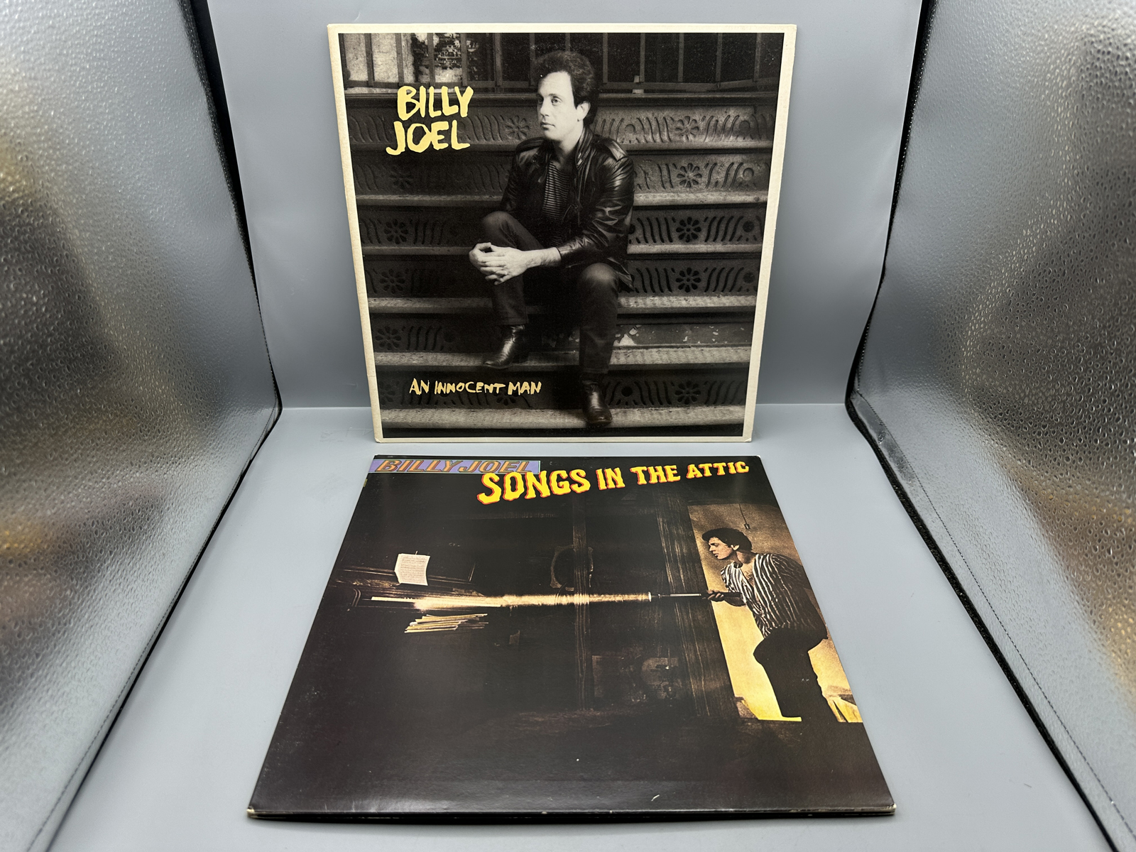 Billy Joel (2 LP Lot): An Innocent Man (1983); and Songs In The Attic (1981), gatefold