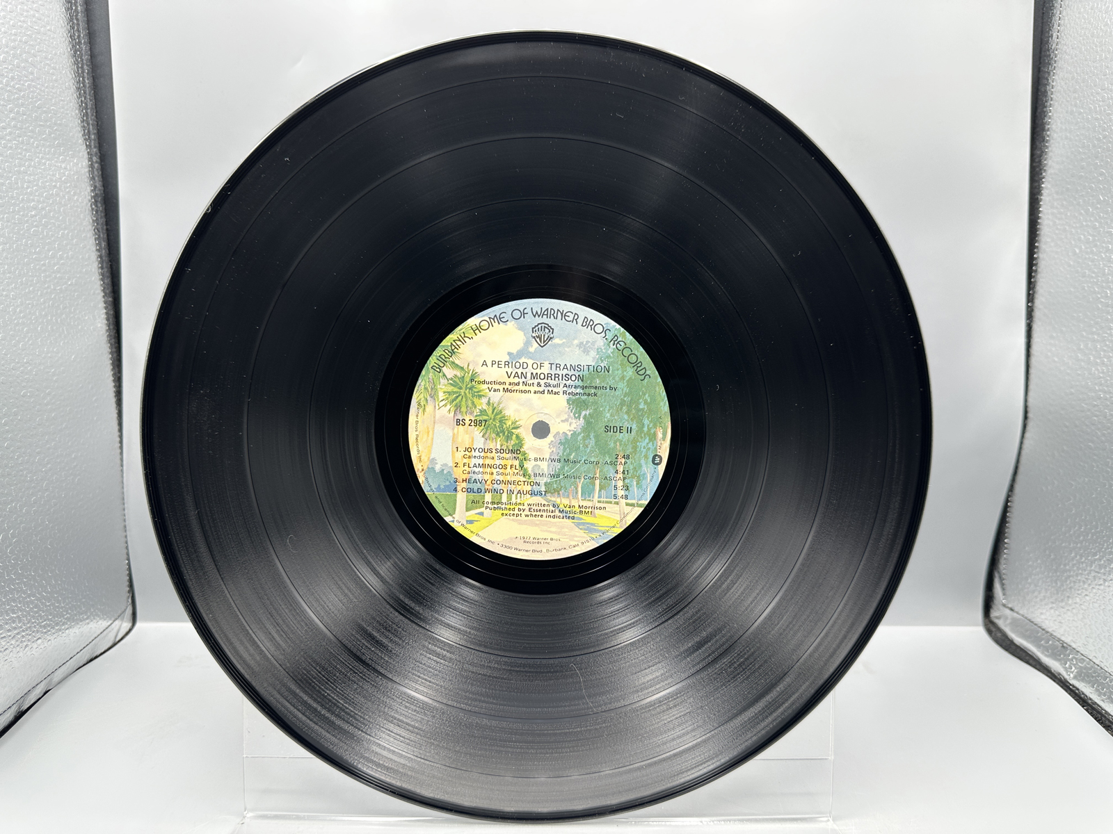 Van Morrison (2 LP Lot): A Period Of Transition (1977), promo hole in cover, in original shrinkwrap; and Beautiful Vision (1982)
