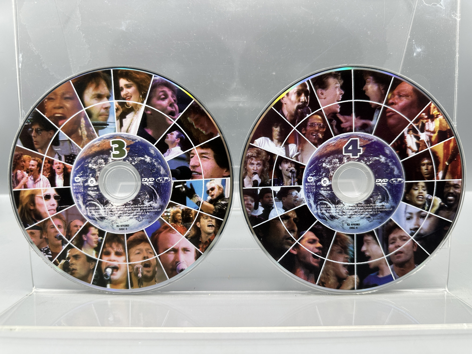 Live Aid: July 13, 1985 - The Day The Music Changed The World (2004), 4 DVD Box Set (DVD-Video, NTSC). Billed as One Concert - Two Continent