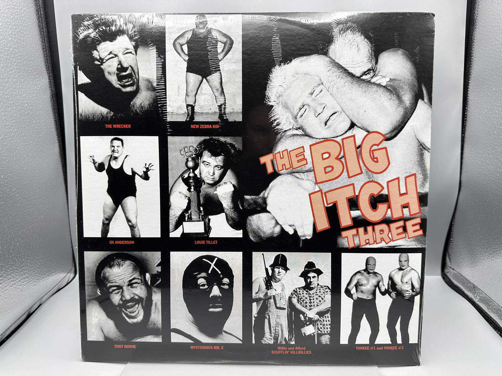 SEALED - The Big Itch Three (press date unknown). Compilation LP of various artists (garage rock, rockabilly, rock n' roll, funk, novelty) c
