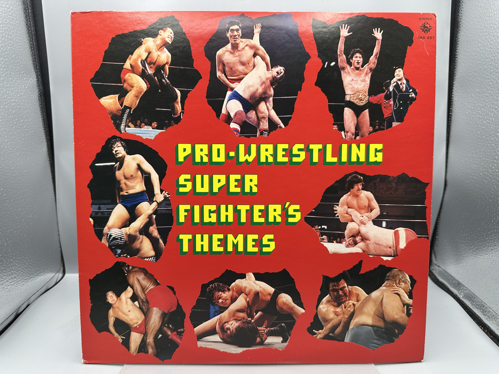 Pro-Wrestling Super Fighter's Themes (1979), Japan pressing. Cover features action pictures of 1970's Japanese pro wrestlers.