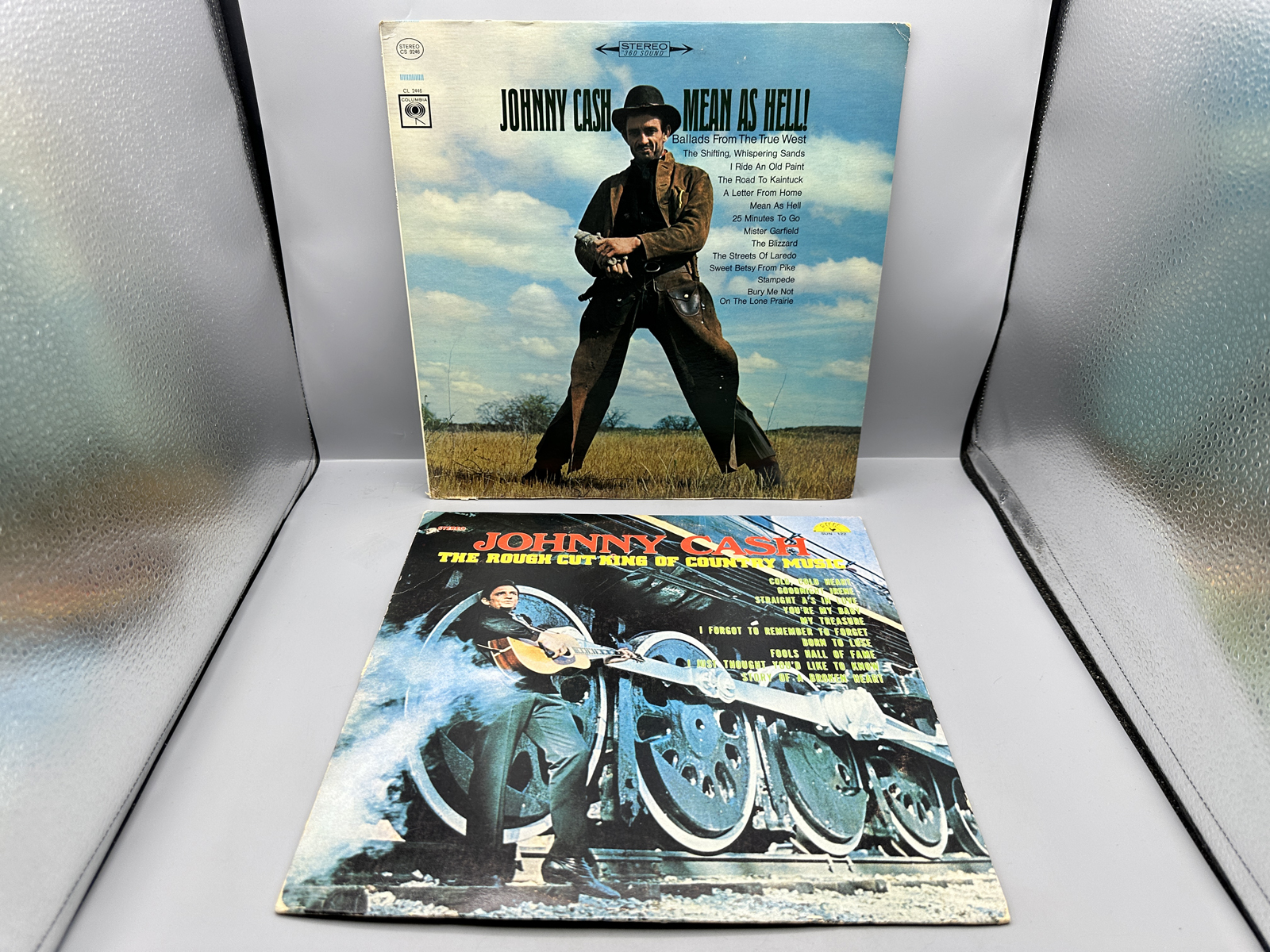 Johnny Cash (2 LP Lot): Mean As Hell (1966); and The Rough Cut King Of Country Music (1970), Sun label