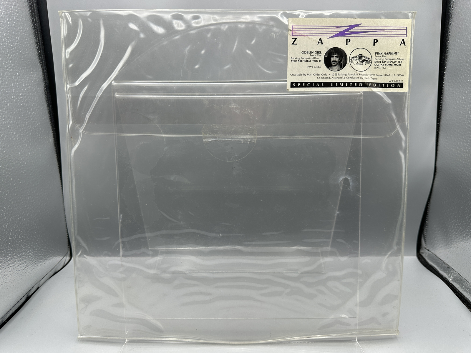 Frank Zappa - 12-inch 45 rpm Picture Disc: Goblin Girl/Pink Napkins (1981), in original clear polyvinyl envelope sleeve with hype sticker