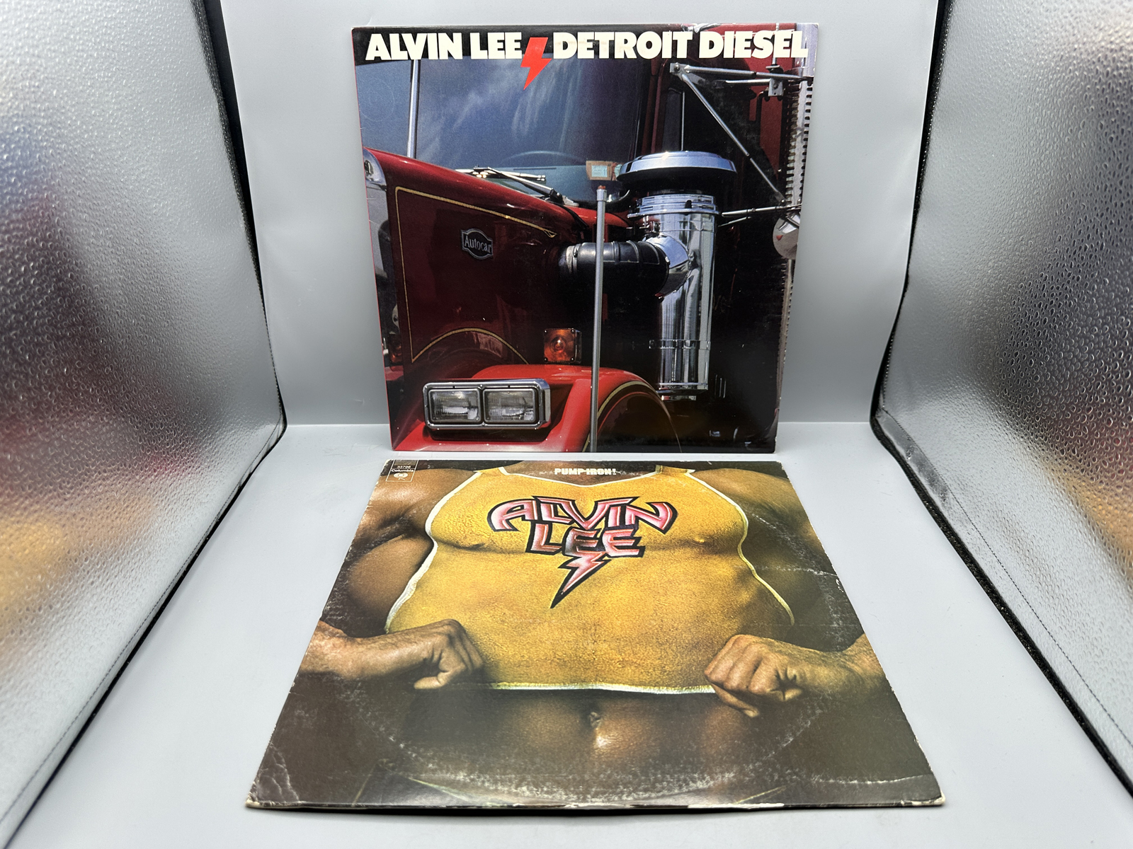 Alvin Lee (2 LP Lot): Detroit Diesel (1986); and Pump Iron! (1975)