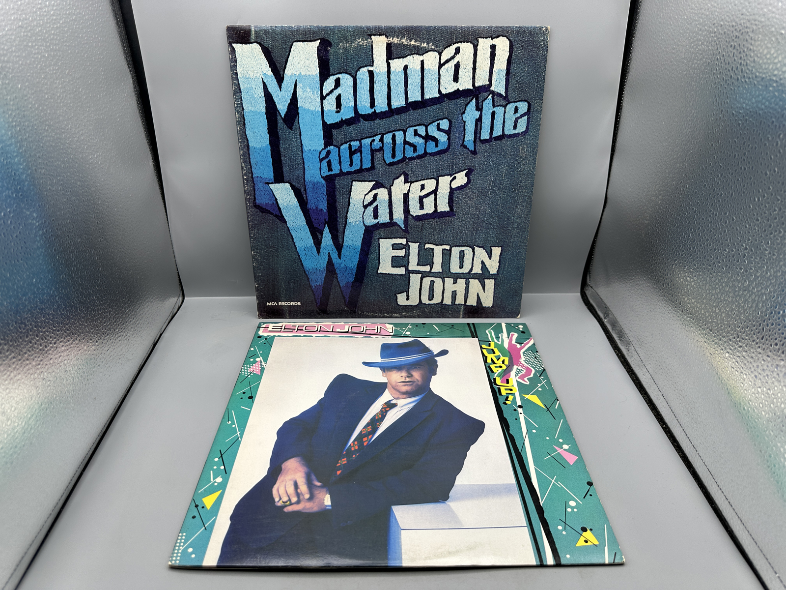 Elton John (2 LP Lot): Madman Across The Water (1980), reissue; and Jump Up! (1982)