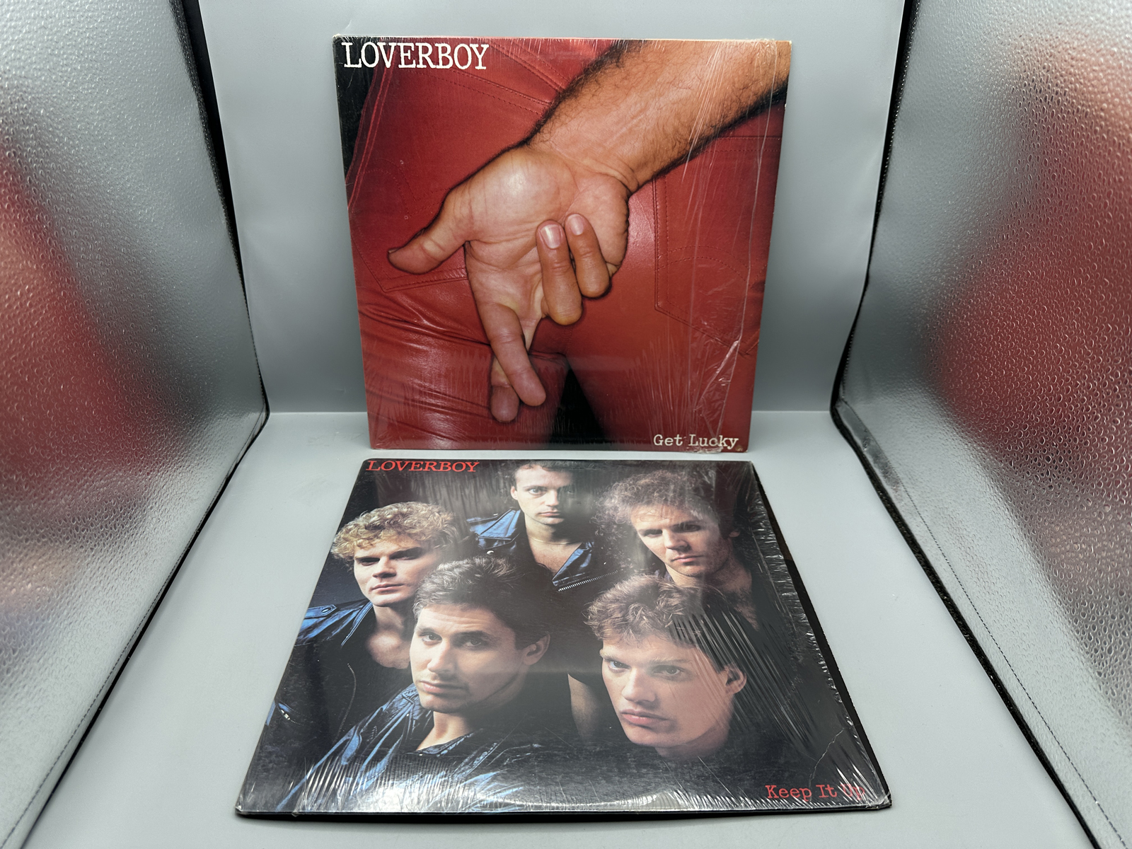 Loverboy (2 LP Lot): Get Lucky (1981); and Keep It Up (1983), both LPs in original shrinkwrap