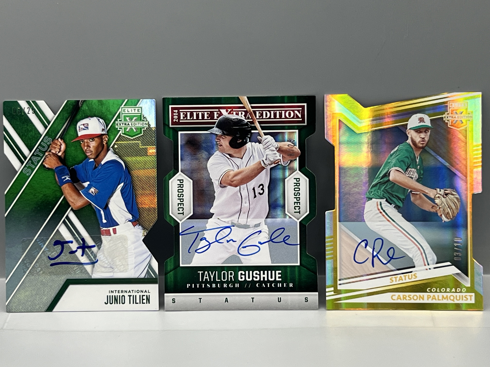 (3) Assorted Pack Pulled Low Serial Numbered Baseball Autos - Junio Tilien #/25, Taylor Gushue #/25, & Carson Palmquist #/10
