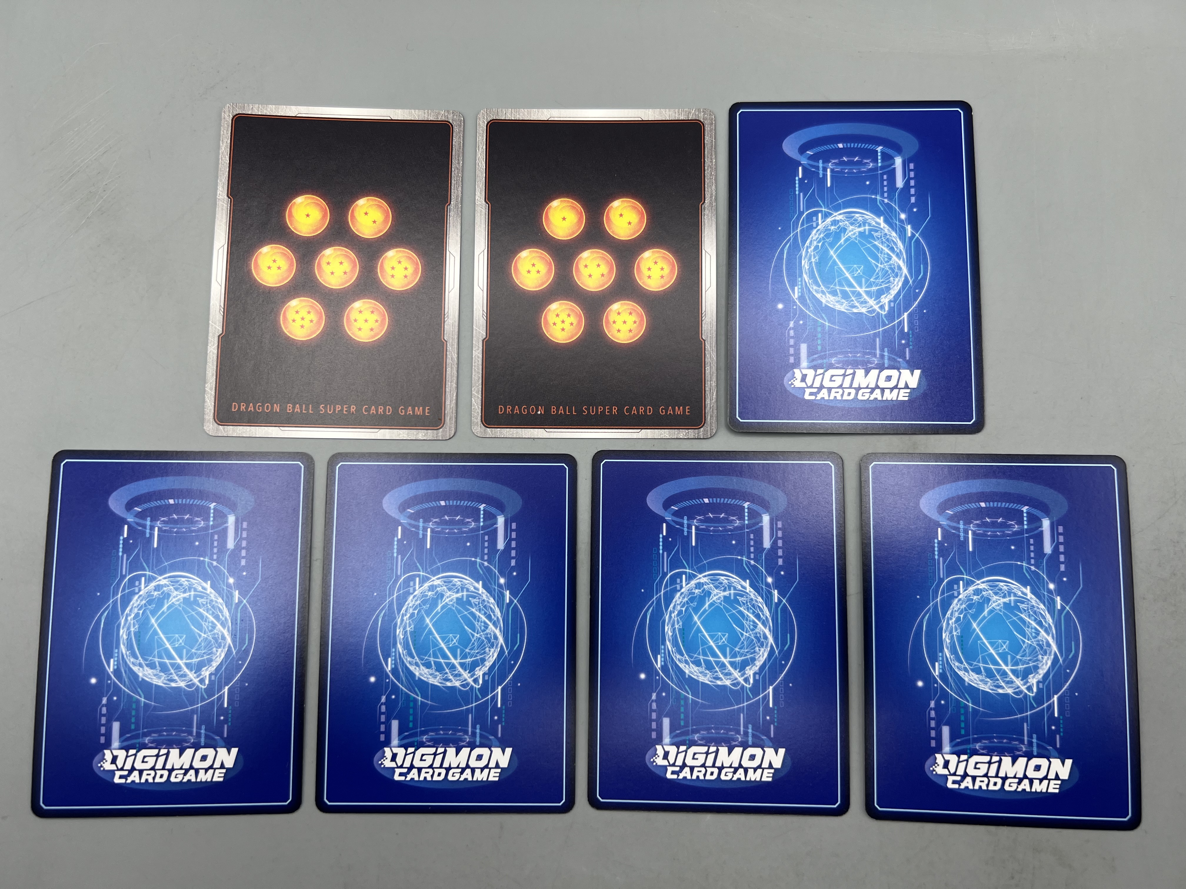 (7) Assorted Dragon Ball Z & Digimon Trading Cards