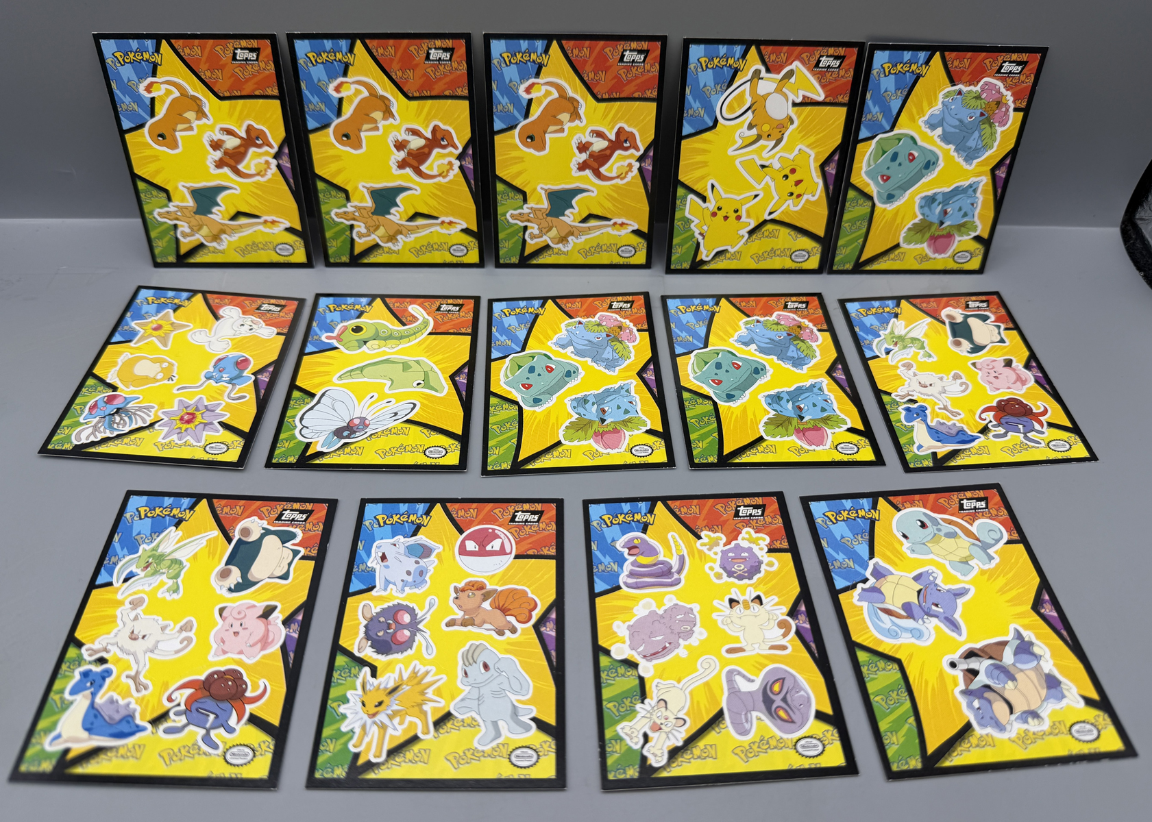 1999 Topps Pokemon The First Movie Sticker Cards Lot of 14 - Charizard (x3), Pikachu, Blastoise