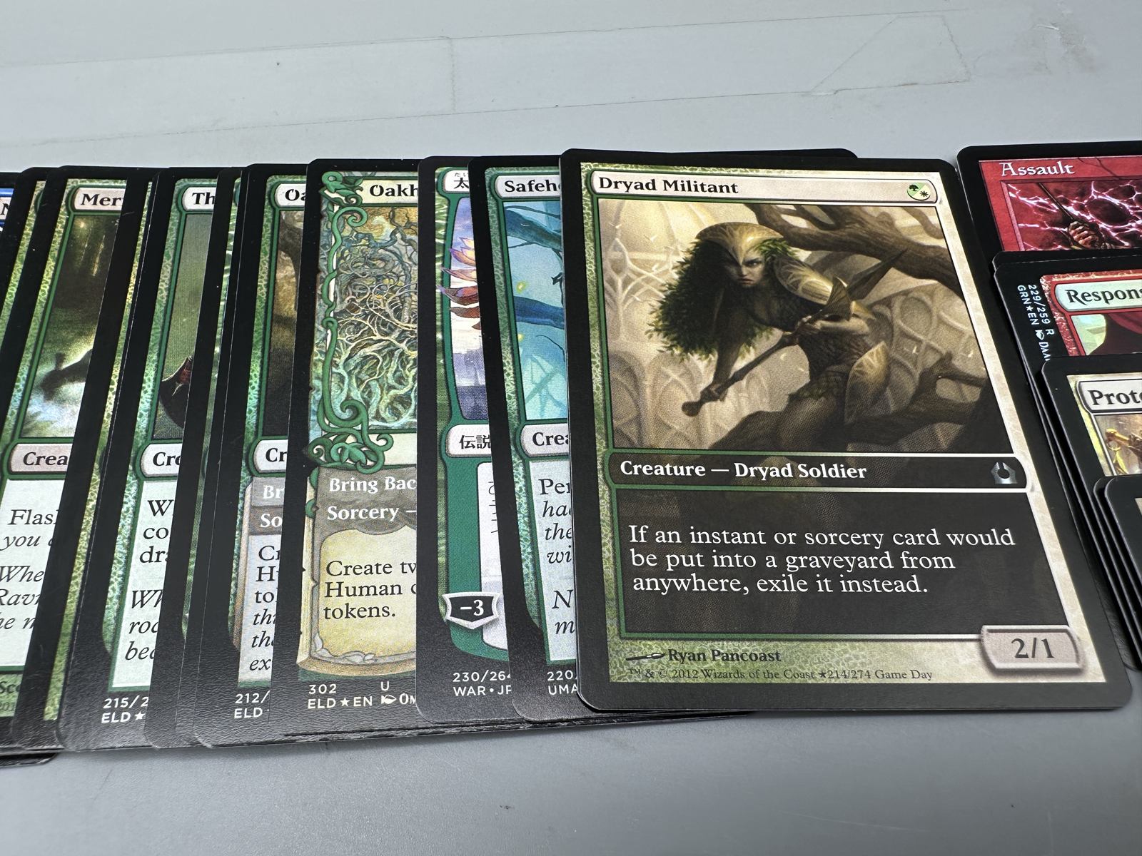 Lot of Magic The Gathering Trading Cards Featuring Promotional Foils and Split Cards