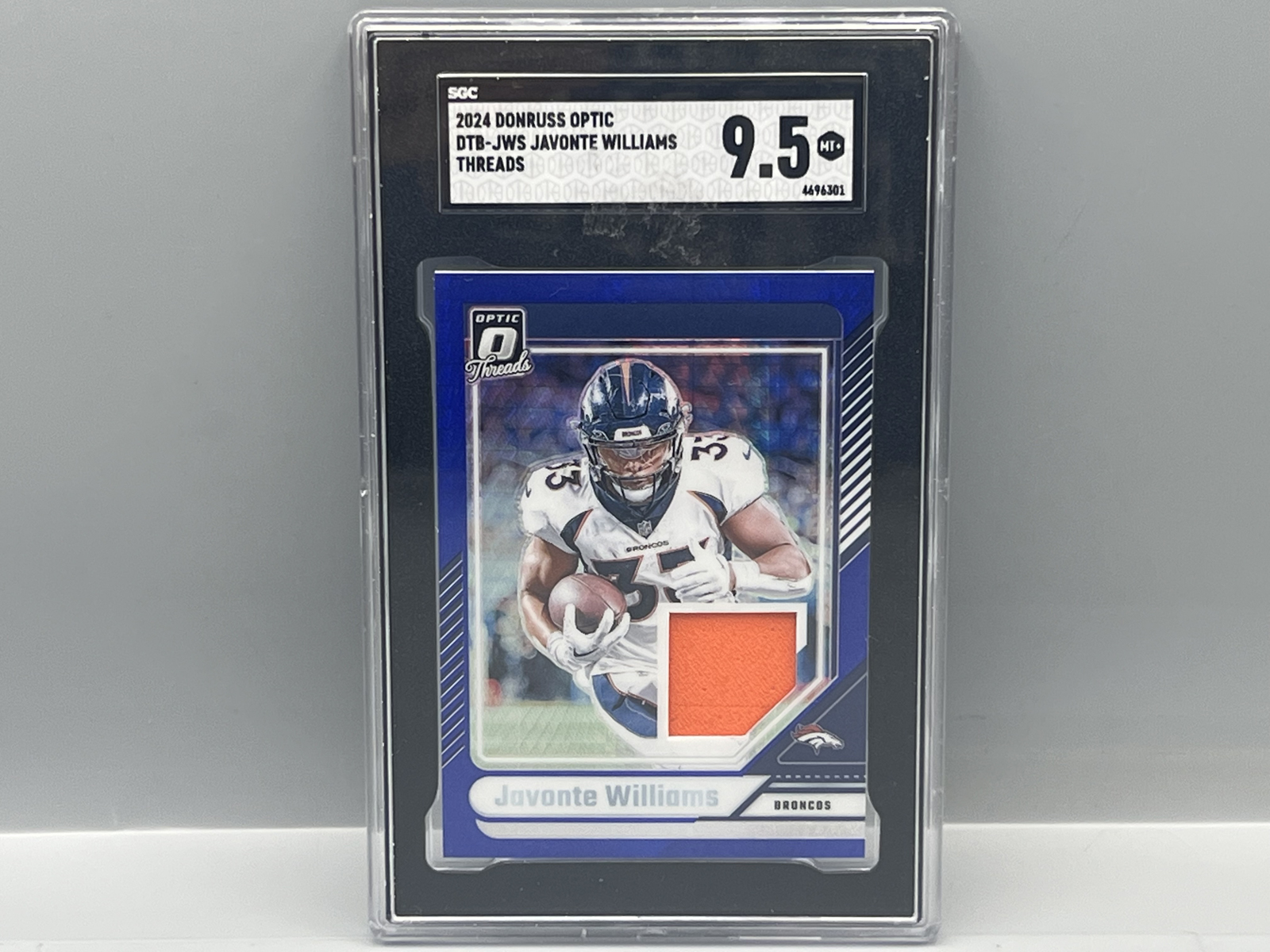 2024 Panini Donruss Optic Javonte Williams Threads Relic #DTB-JWS SGC Mint+ 9.5