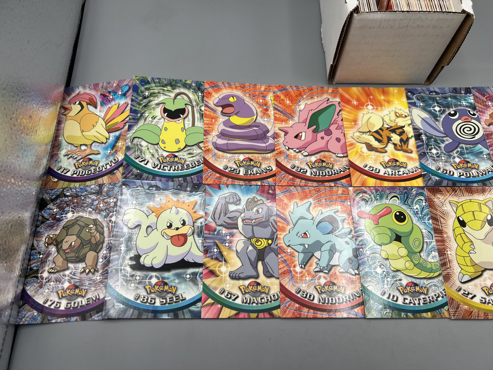 Lot of (100) 1999 Topps Pokemon TV 1st Print Blue Topps Logo Trading Cards W/ Some Duplicates - mostly lower to mid-grade conditions
