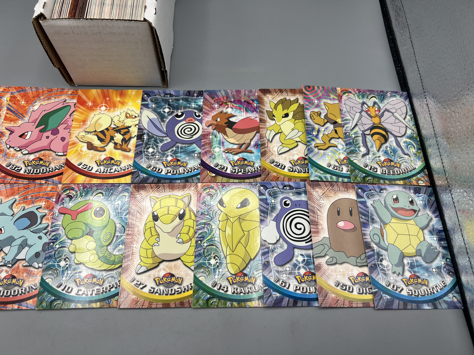 Lot of (100) 1999 Topps Pokemon TV 1st Print Blue Topps Logo Trading Cards W/ Some Duplicates - mostly lower to mid-grade conditions