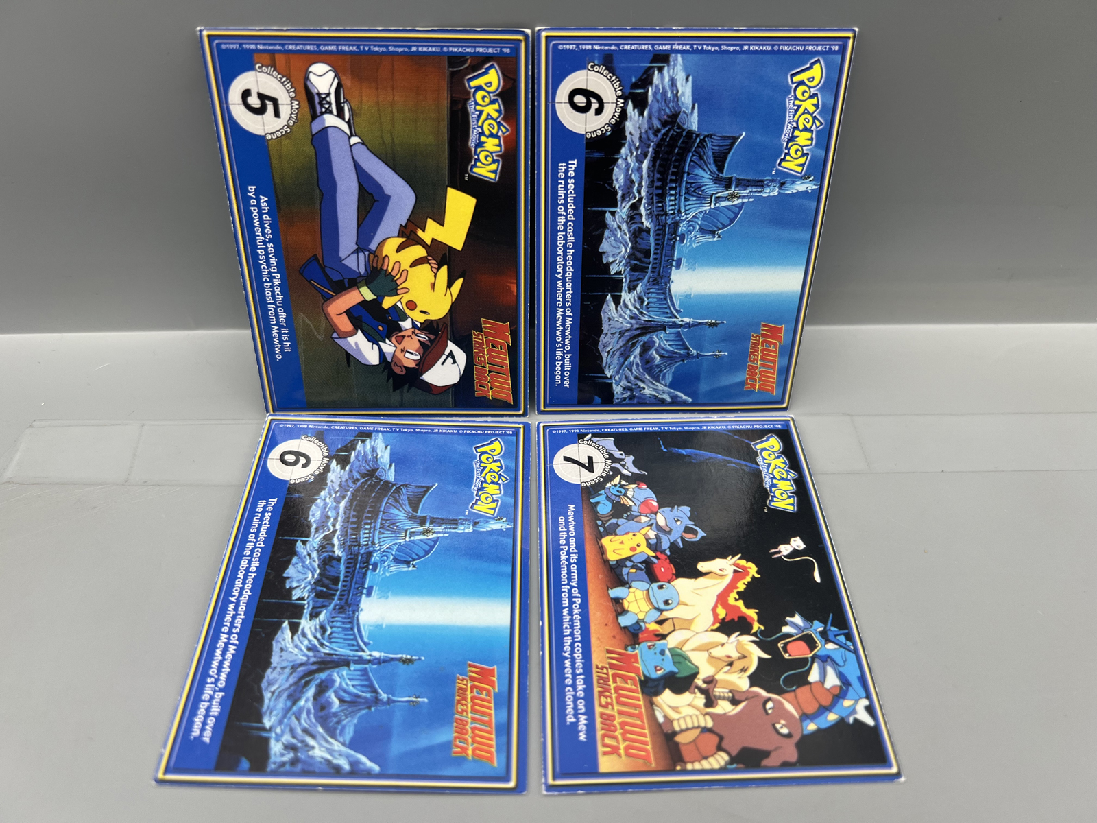 Lot of (4) 1999 Burger King Pokemon The First Movie Poketrivia Cards - Varying Conditions