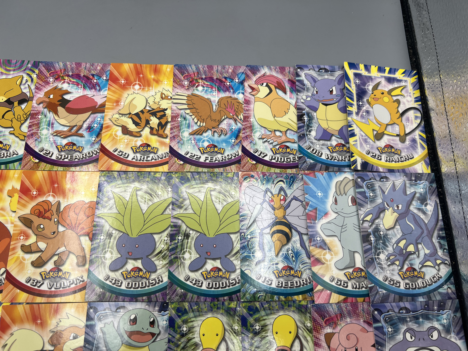 Lot of (33) 1999 Topps Pokemon TV 2nd Print Black Topps Logo Trading Cards - Varying Conditions