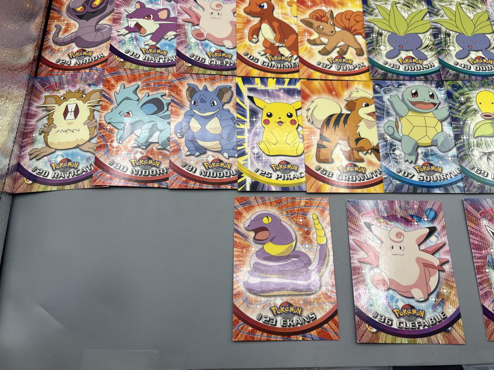Lot of (33) 1999 Topps Pokemon TV 2nd Print Black Topps Logo Trading Cards - Varying Conditions