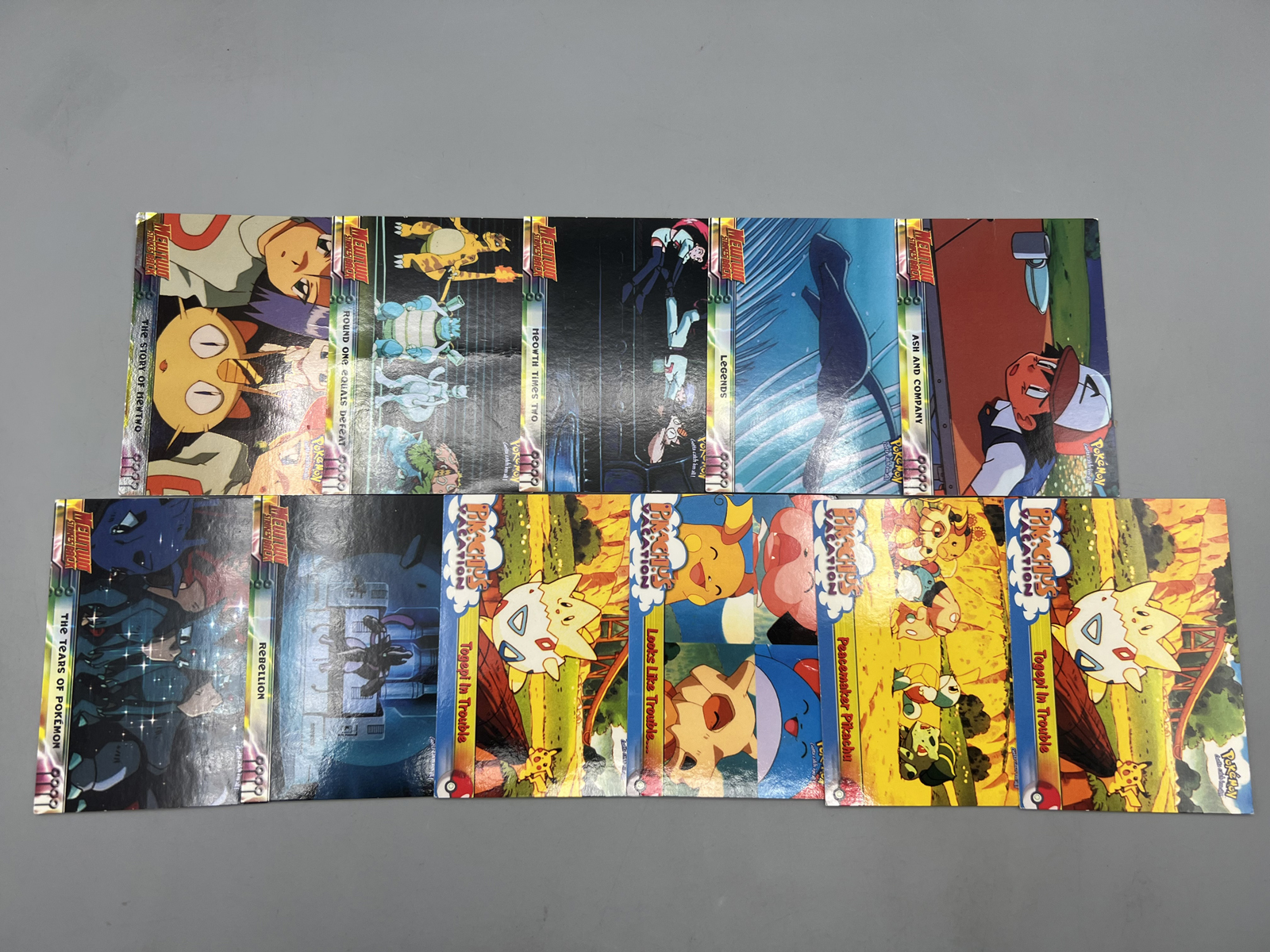 Lot of (11) 1999 Topps Pokemon Mewtwo Strikes Back Movie 1st Print Blue Topps Logo Trading Cards - Varying Conditions