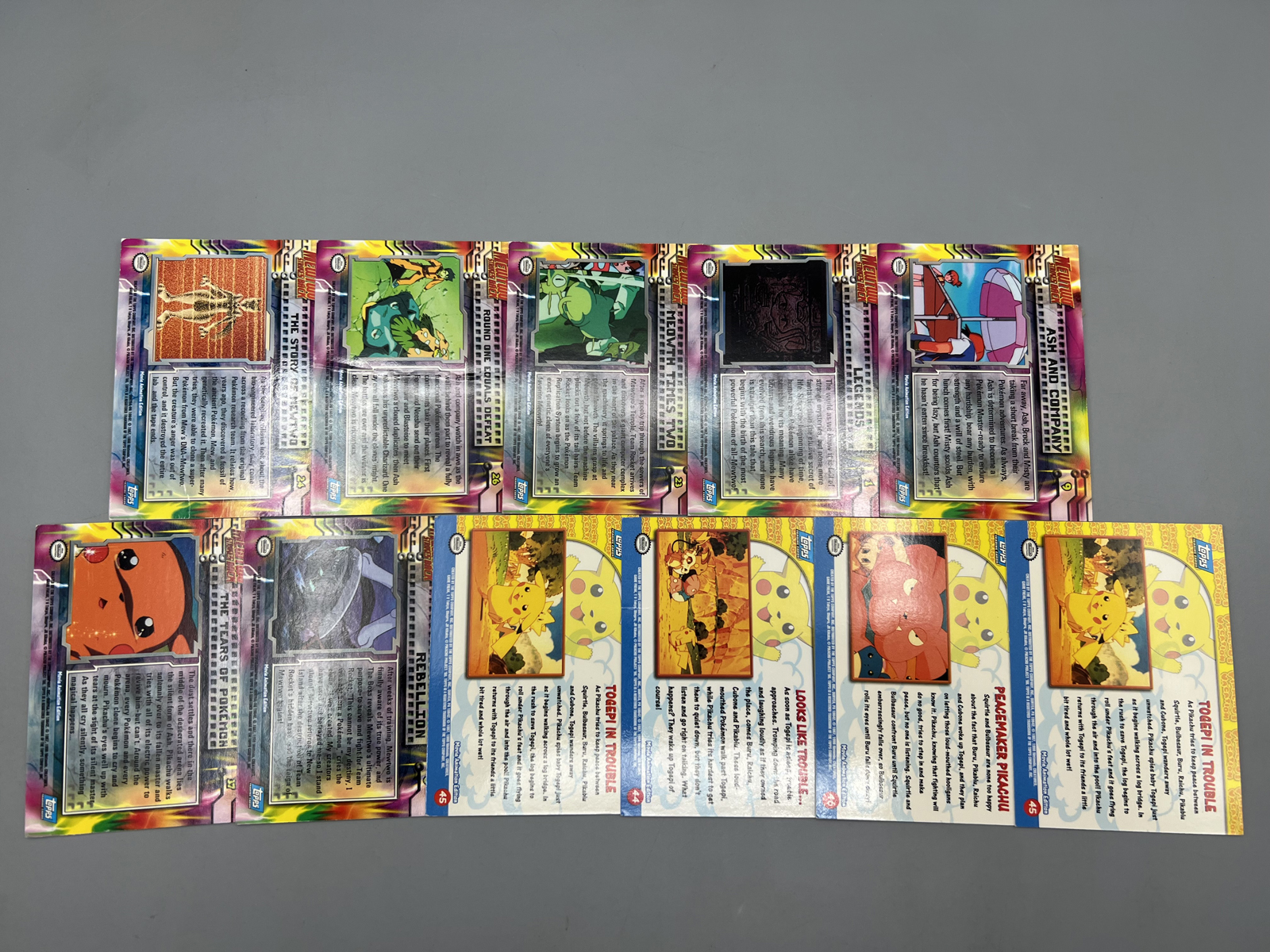 Lot of (11) 1999 Topps Pokemon Mewtwo Strikes Back Movie 1st Print Blue Topps Logo Trading Cards - Varying Conditions