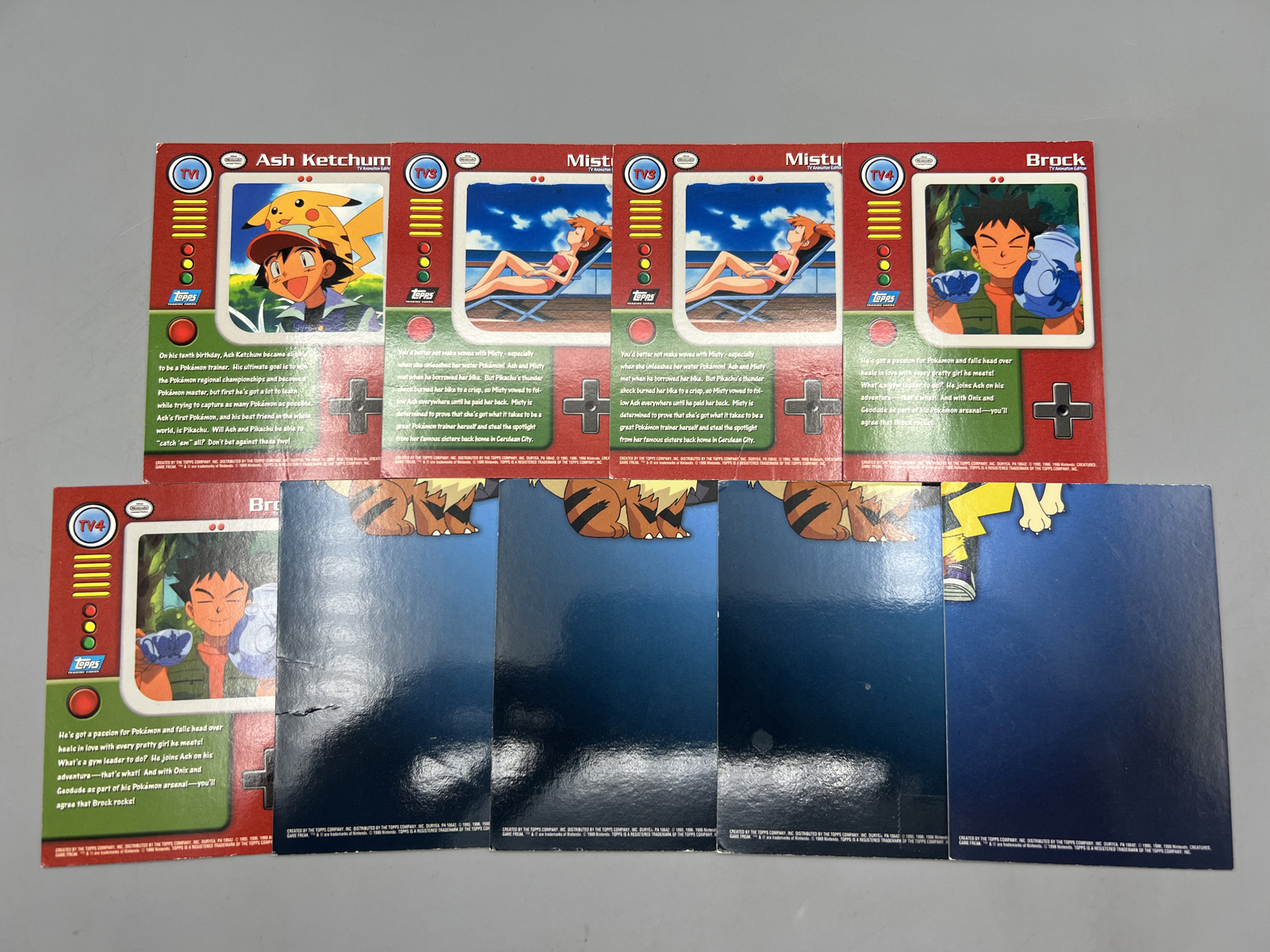 Lot of (9) 1999 Topps Pokemon Series One Trading Cards W/ 1st & 2nd Prints - Varying Conditions