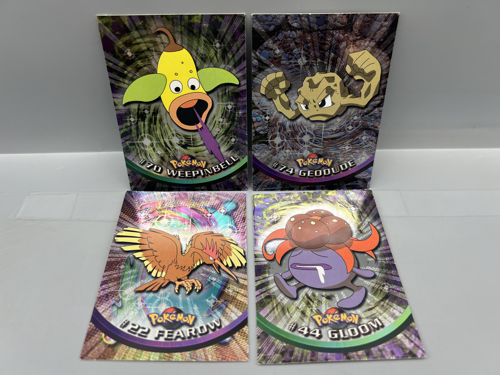 Lot of (4) 1999 Topps Pokemon TV 2nd Print Black Topps Logo Foil Trading Cards - Varying Conditions