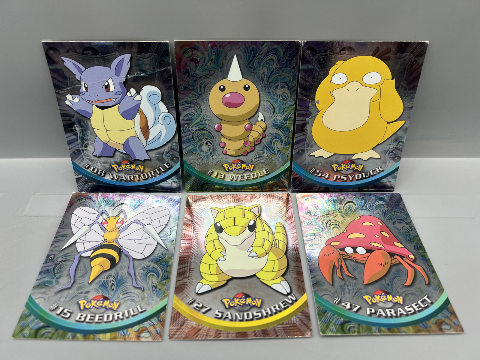 Lot of (6) 1999 Topps Pokemon TV 1st Print Blue Topps Logo Foil Trading Cards - Varying Conditions