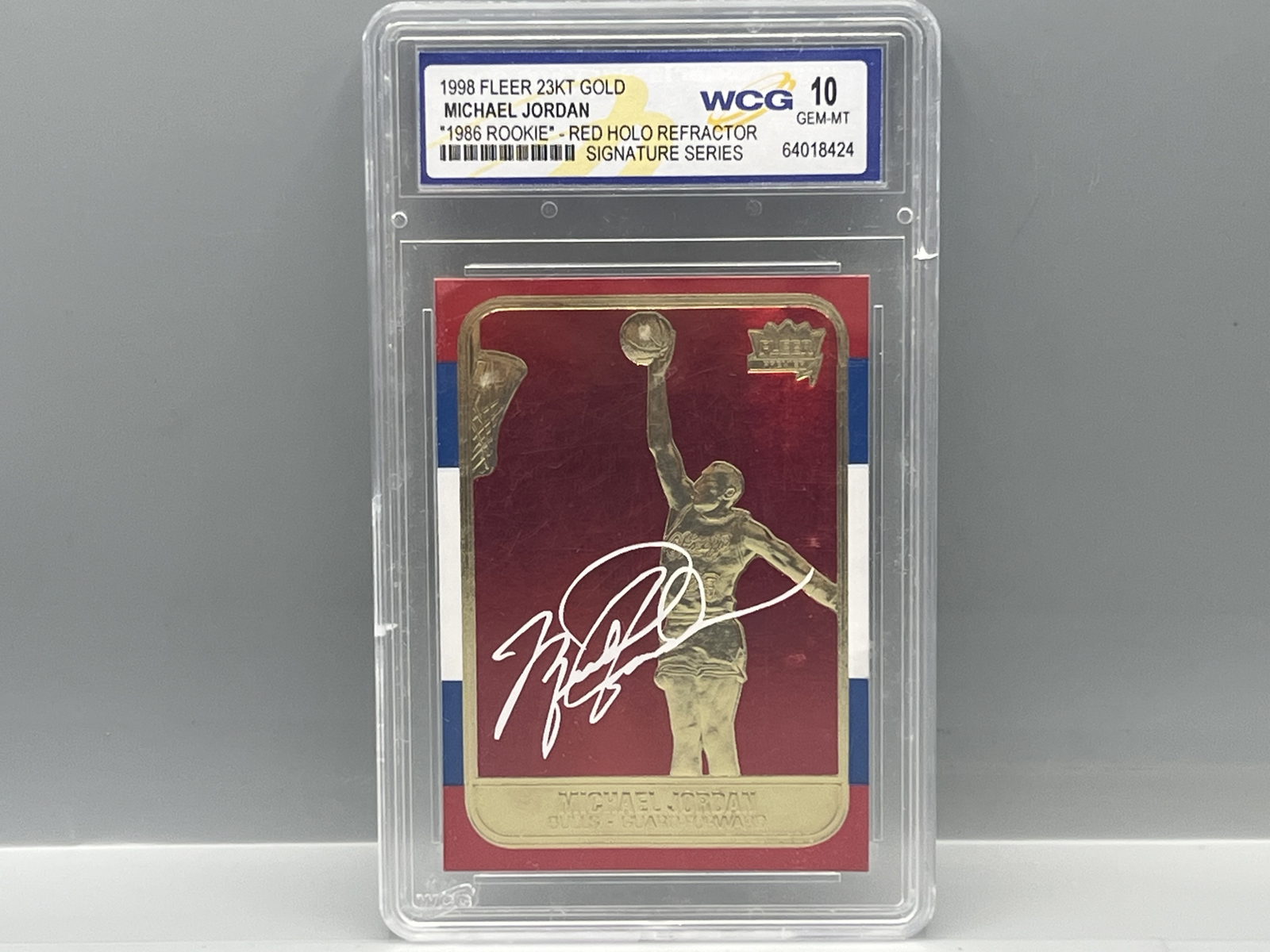 1998 Fleer 23kt Gold Foil Embossed Michael Jordan '86 Rookie Red Holo Refractor Signature Series - Slabbed By WCG Grading