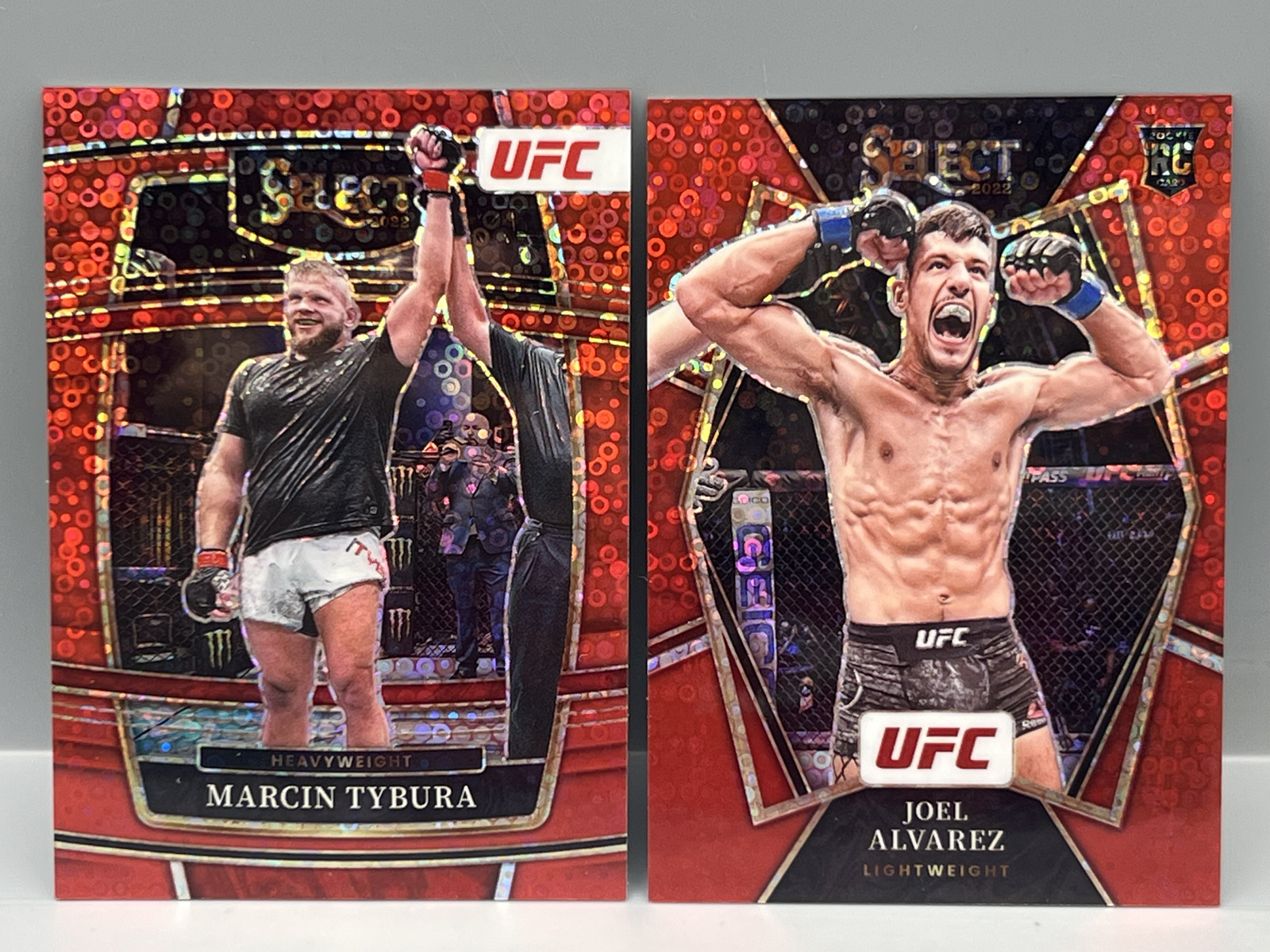 2022 Panini Select UFC Marcin Tybura Red Disco #/99 & Joel Alvarez Red Disco RC #/99