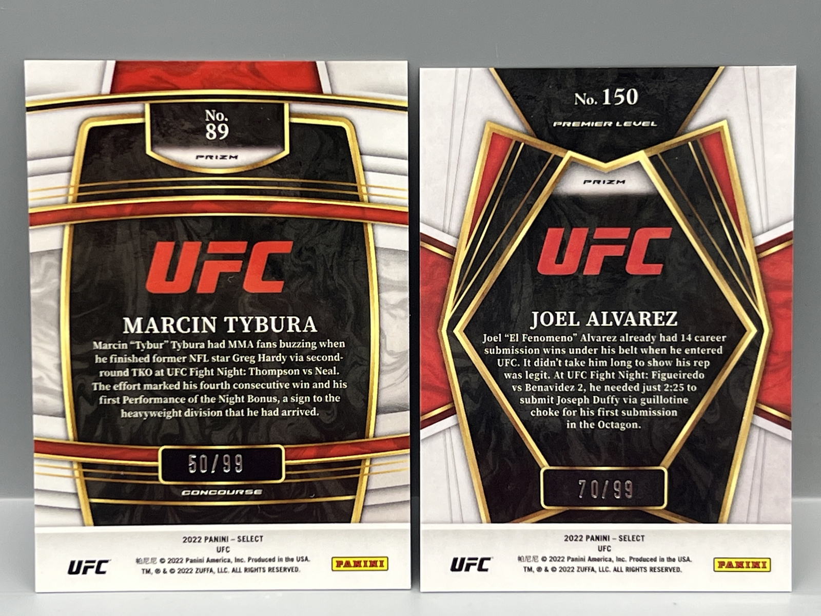 2022 Panini Select UFC Marcin Tybura Red Disco #/99 & Joel Alvarez Red Disco RC #/99