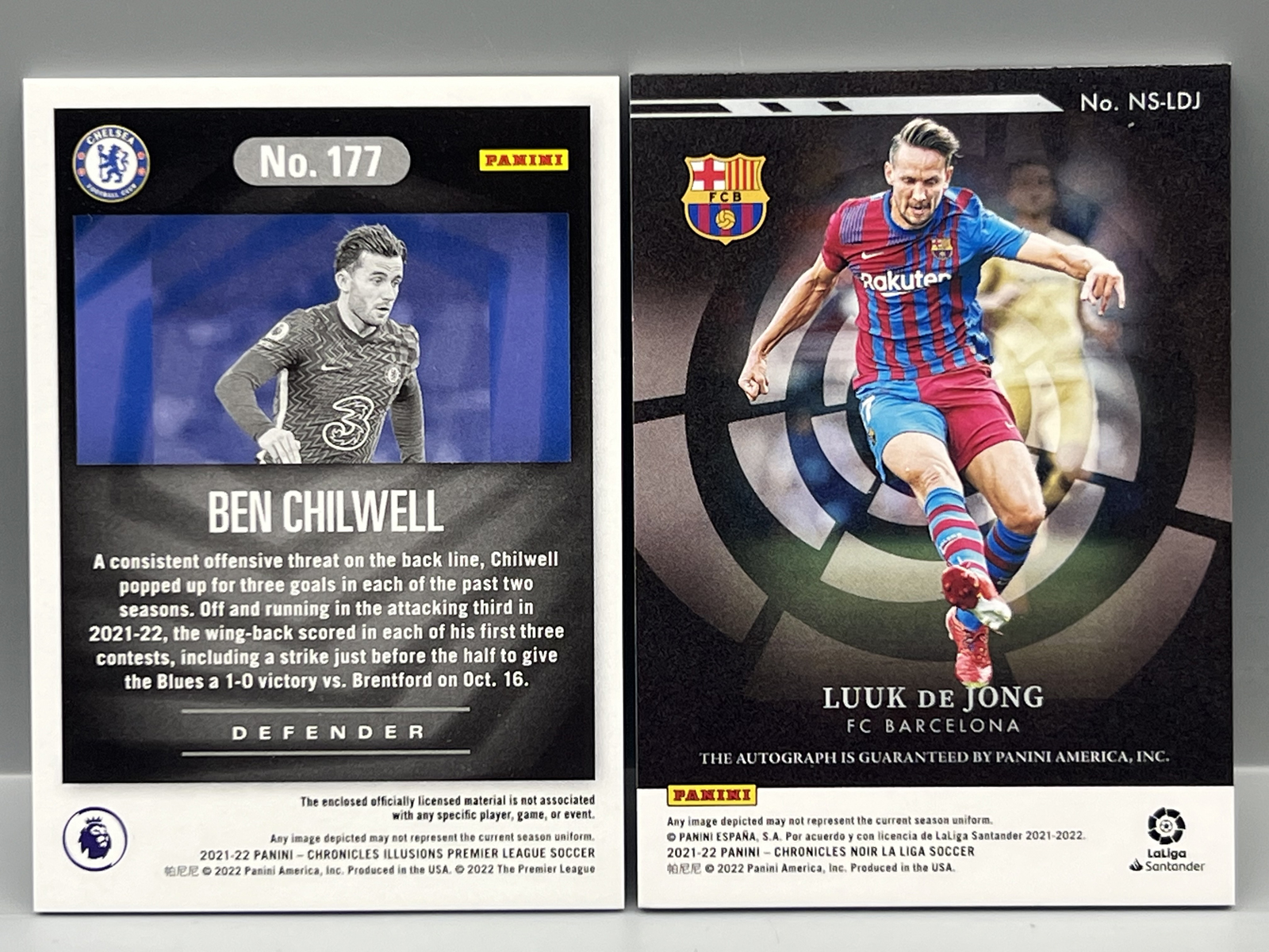 2021-22 Panini Chronicles Illusions Premier League Ben Chilwell Relic #/199 & 2021-22 Panini Chronicles Noir La Liga Luuk De Jong Auto #/199