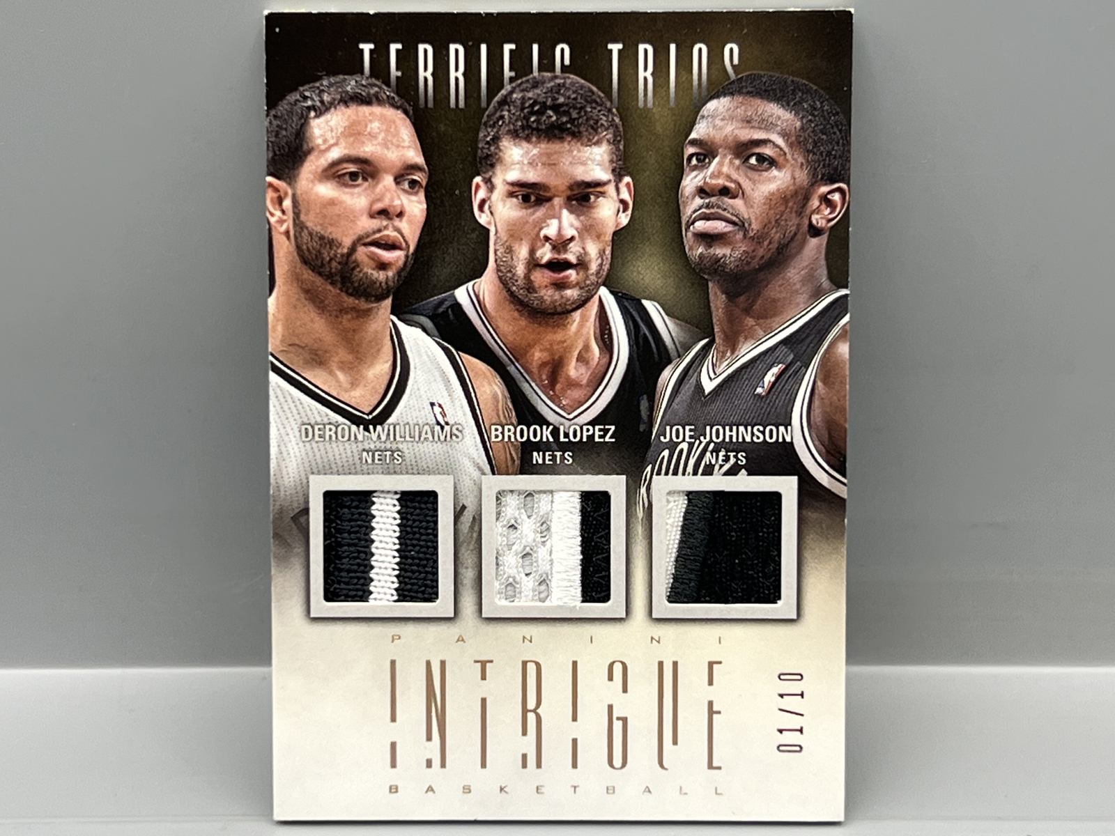 2012-13 Panini Intrigue Terrific Trios Deron Williams/Brook Lopez/Joe Johnson Triple Prime Game Used Patch #/10