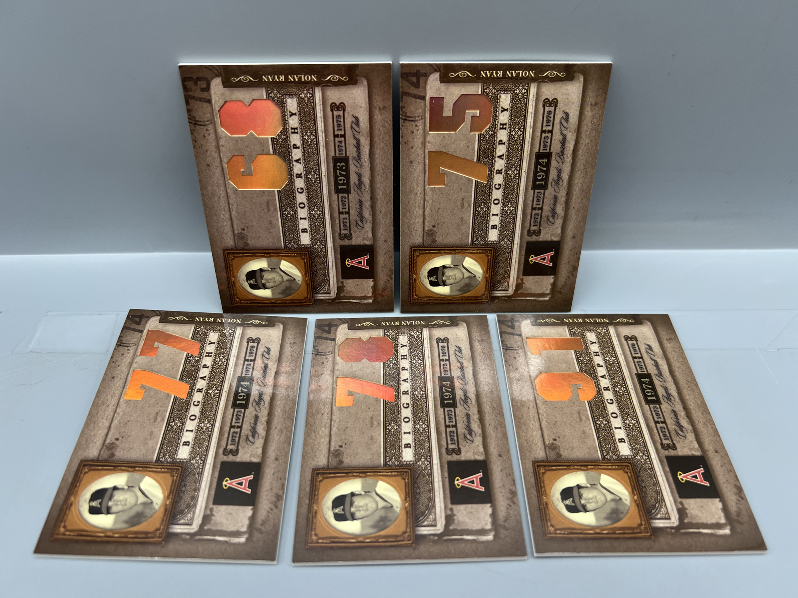 (5) 2005 Playoff Nolan Ryan Biography Cards
