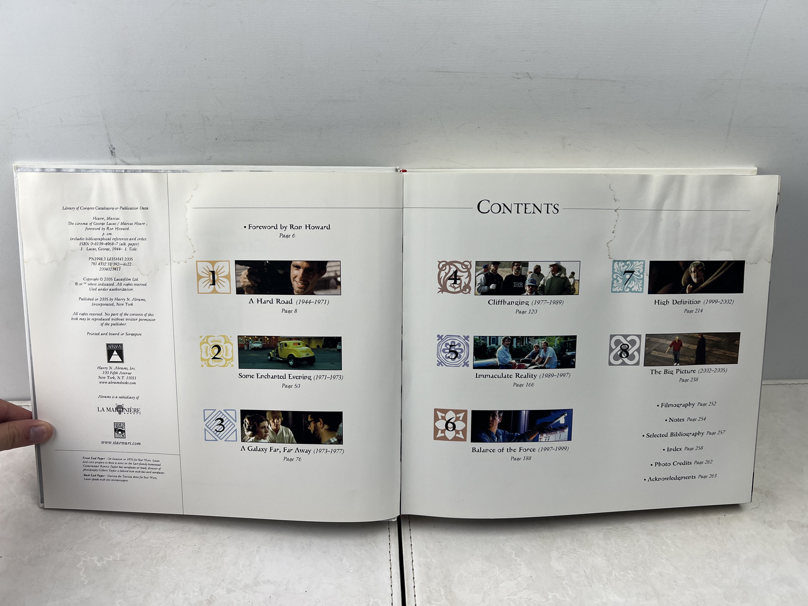 The Cinema of George Lucas Hardcover 2005 First Edition - wear to cover & water damage on interior