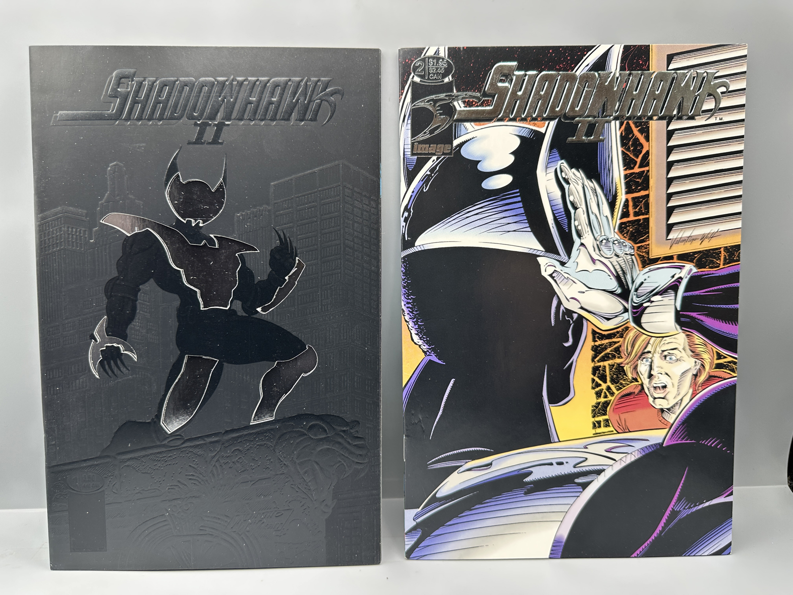 Image Comics Shadowhawk II #1 and #2 (1993) - #1 Black embossed die-cut variant - #2 Features fold-out splash page - Jim Valentino art