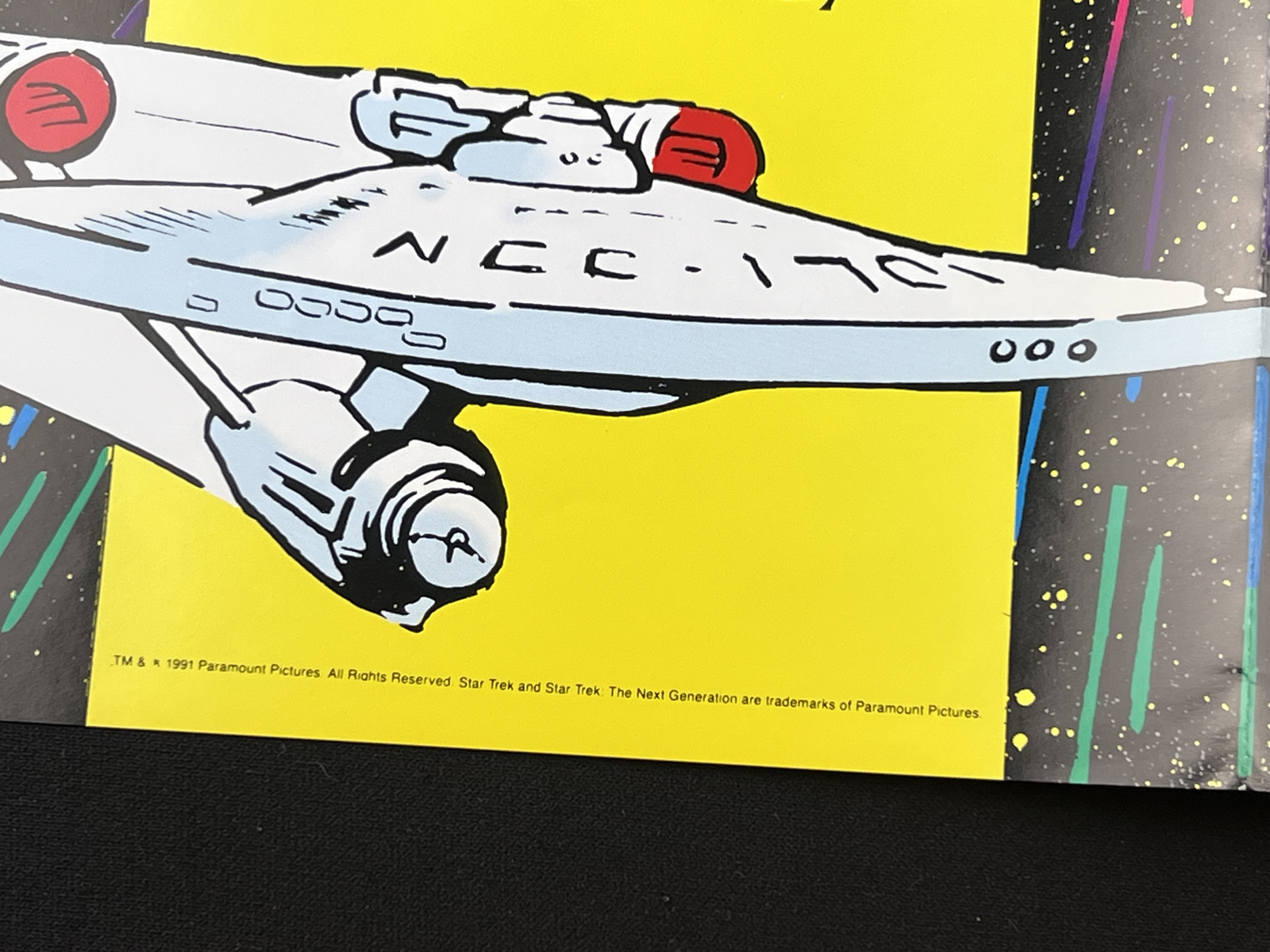 Star Trek Spaceflight Chronology (1980) and 25th Anniversary DC Comics Poster (1991).