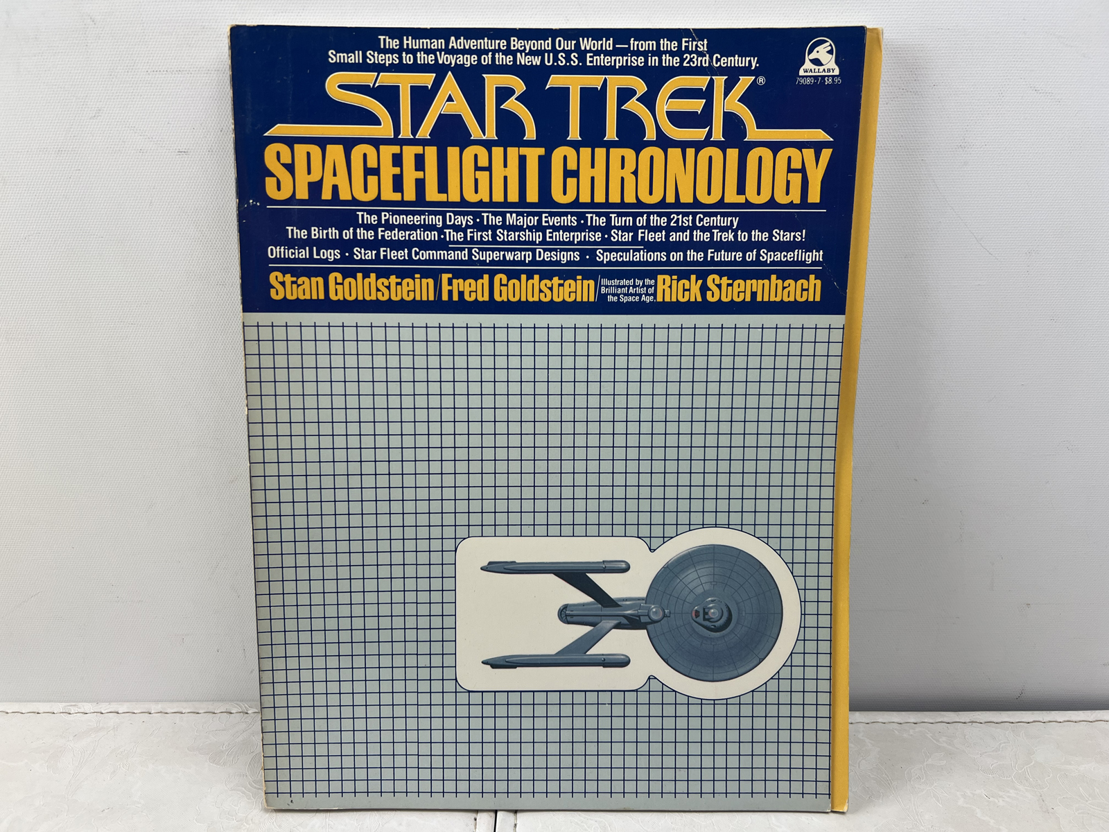 Star Trek Spaceflight Chronology (1980) and 25th Anniversary DC Comics Poster (1991).