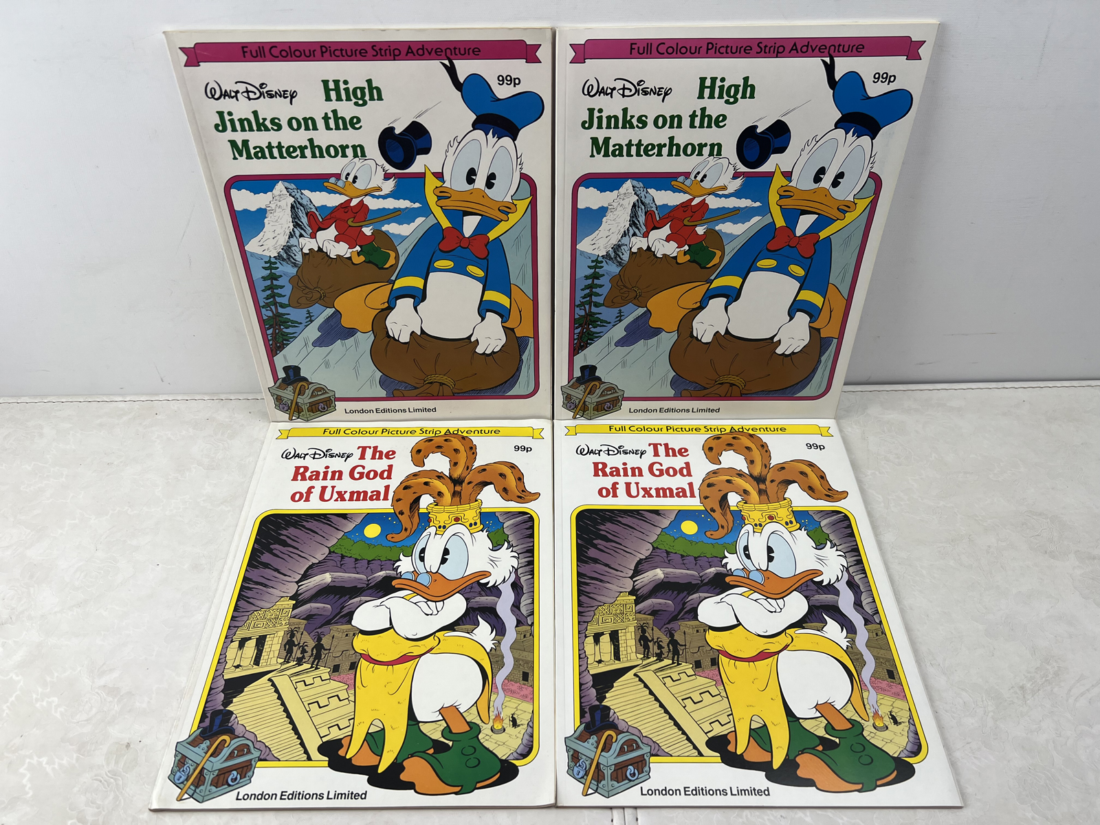 1985 London Editions Limited Walt Disney Full Colour Picture Strip Adventure Lot of 4 - High Jinks on the Matterhorn and The Rain God of Uxm