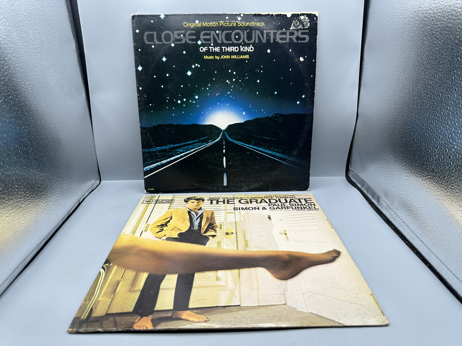 Two Original Motion Picture Soundtrack Vinyl LPs - Close Encounters of the Third Kind w/ Bonus Promo 7" and The Graduate