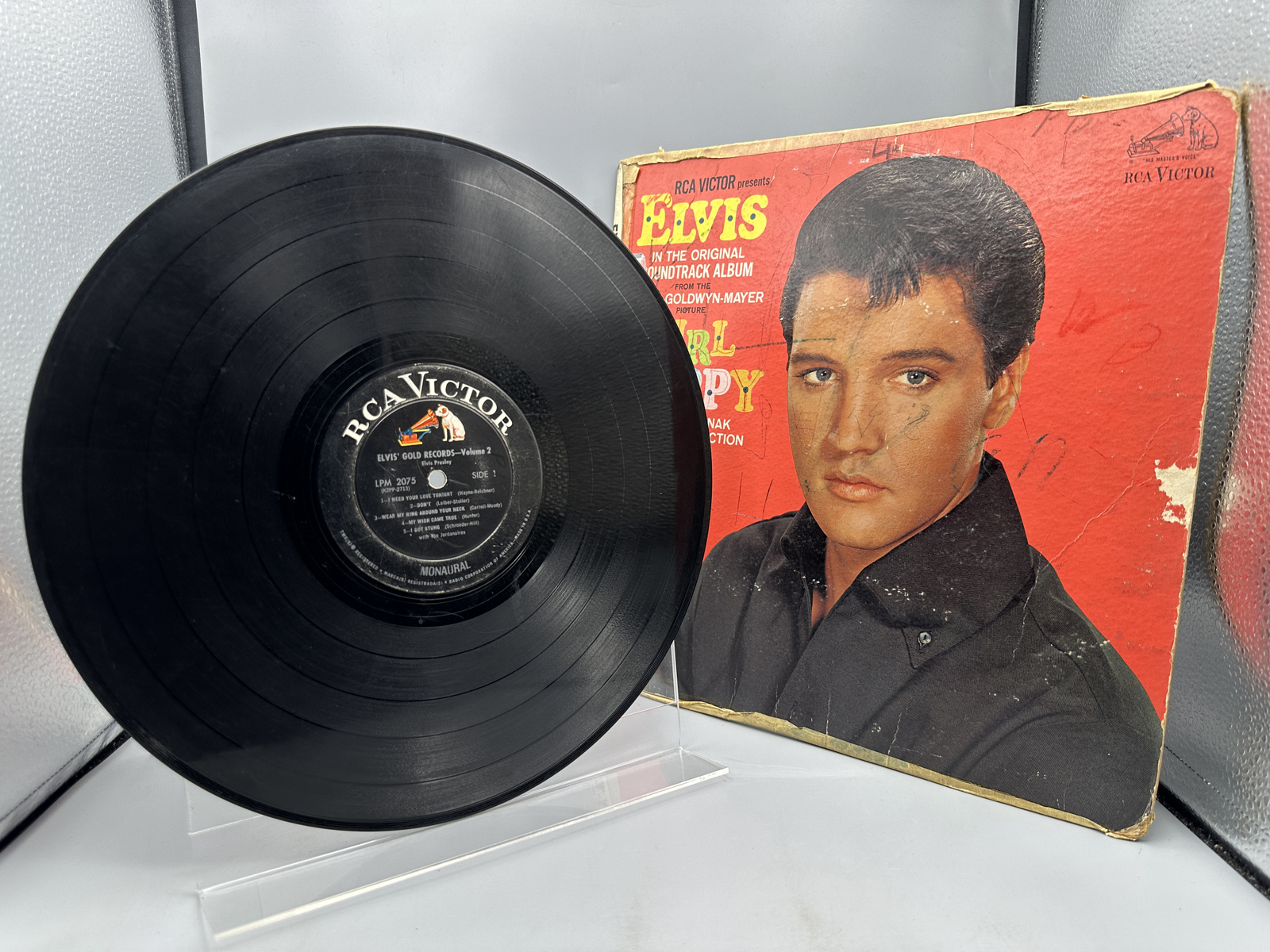 Mismatched Elvis Presley Vinyl Record and Album Sleeve including Girl Happy and Gold Records Volume 2