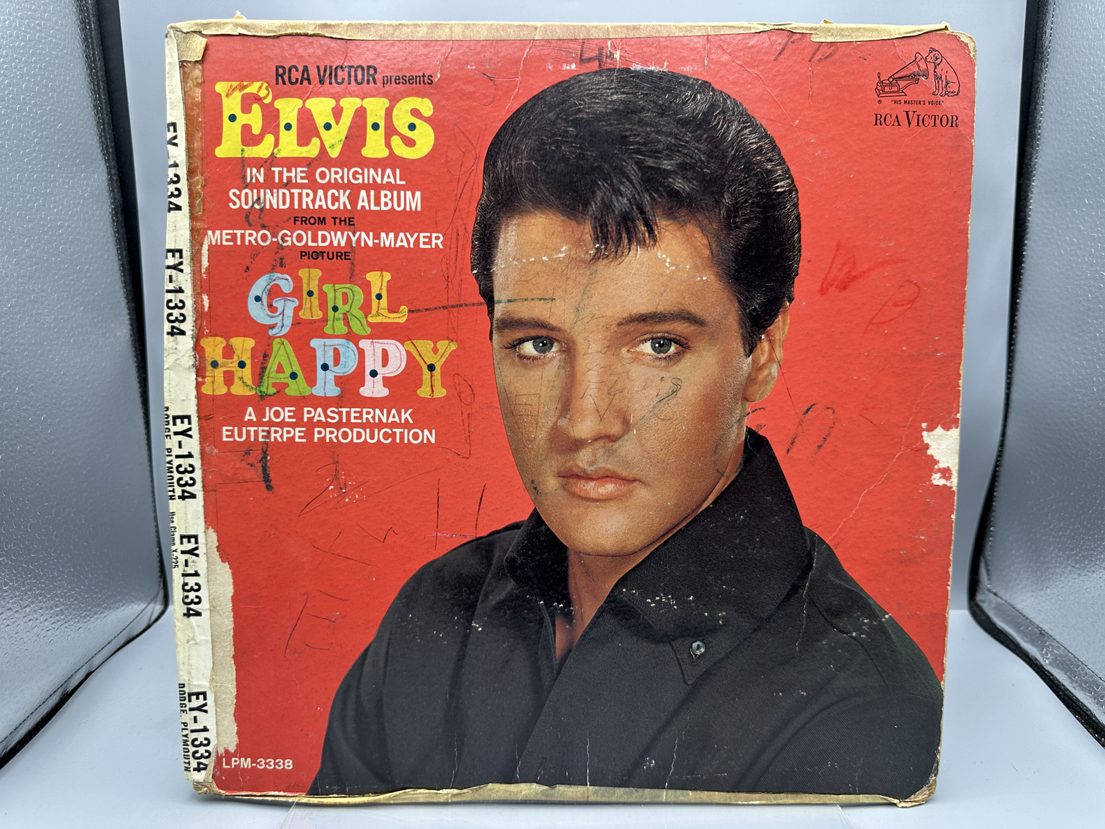 Mismatched Elvis Presley Vinyl Record and Album Sleeve including Girl Happy and Gold Records Volume 2