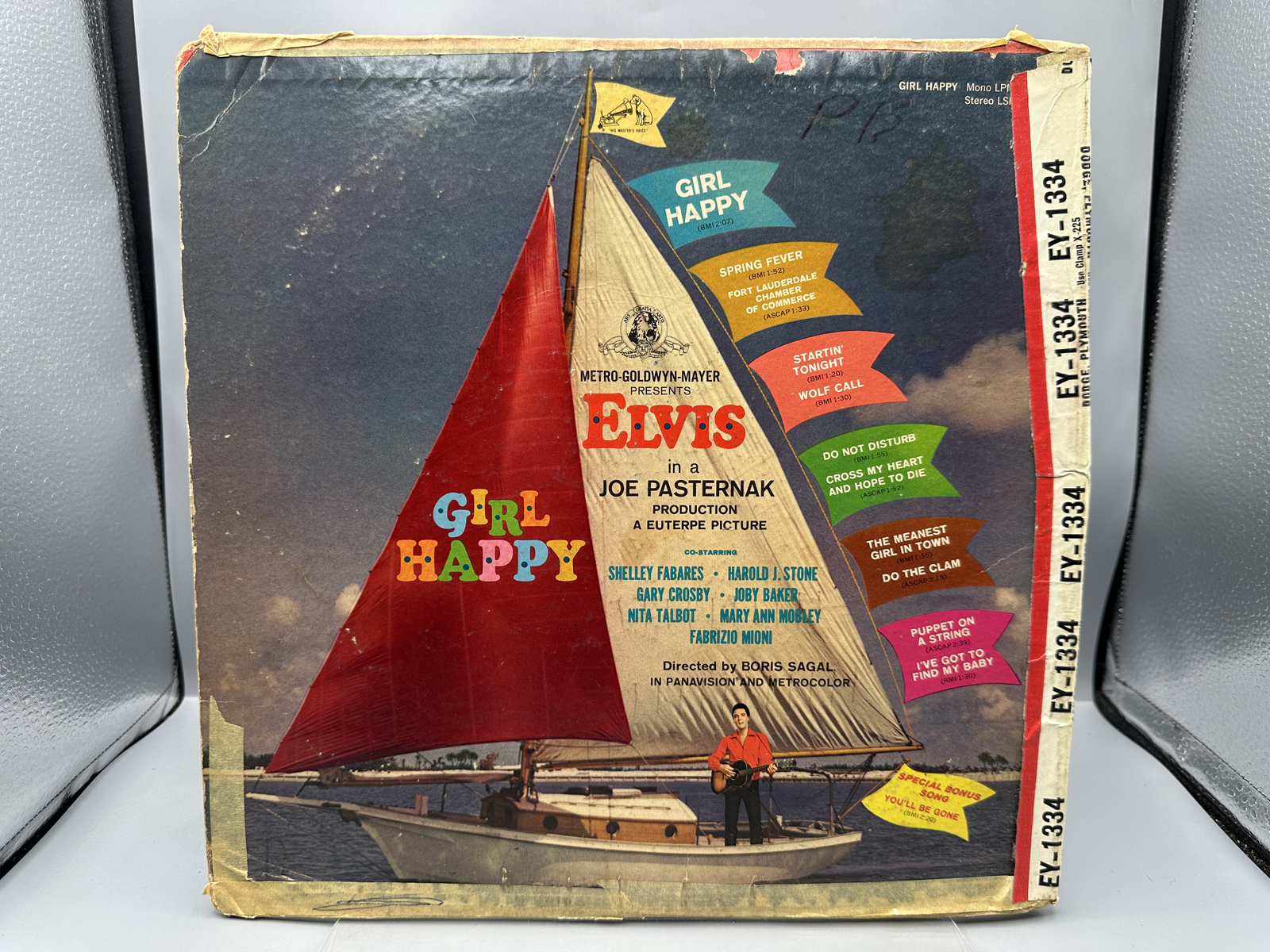 Mismatched Elvis Presley Vinyl Record and Album Sleeve including Girl Happy and Gold Records Volume 2