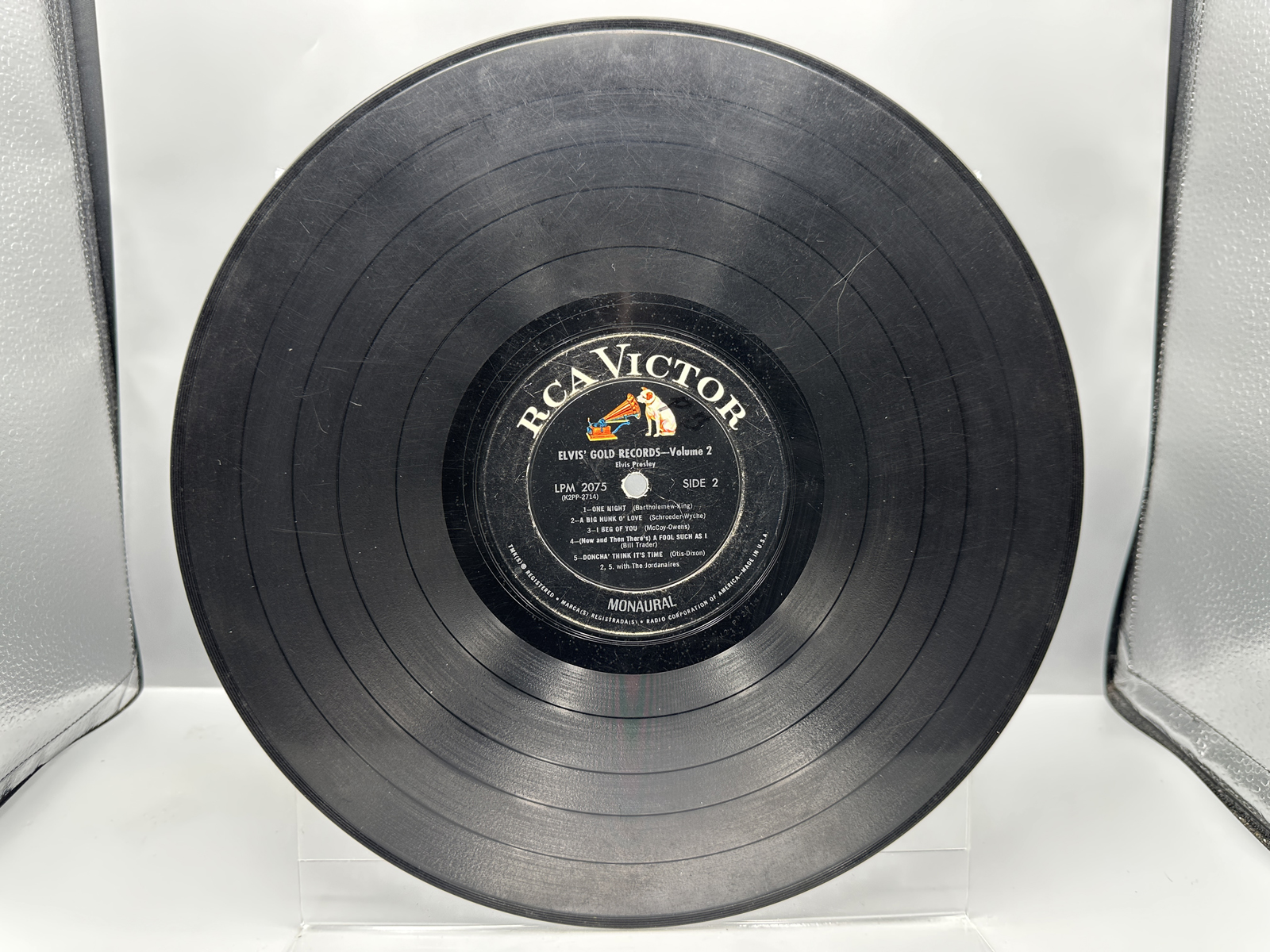 Mismatched Elvis Presley Vinyl Record and Album Sleeve including Girl Happy and Gold Records Volume 2