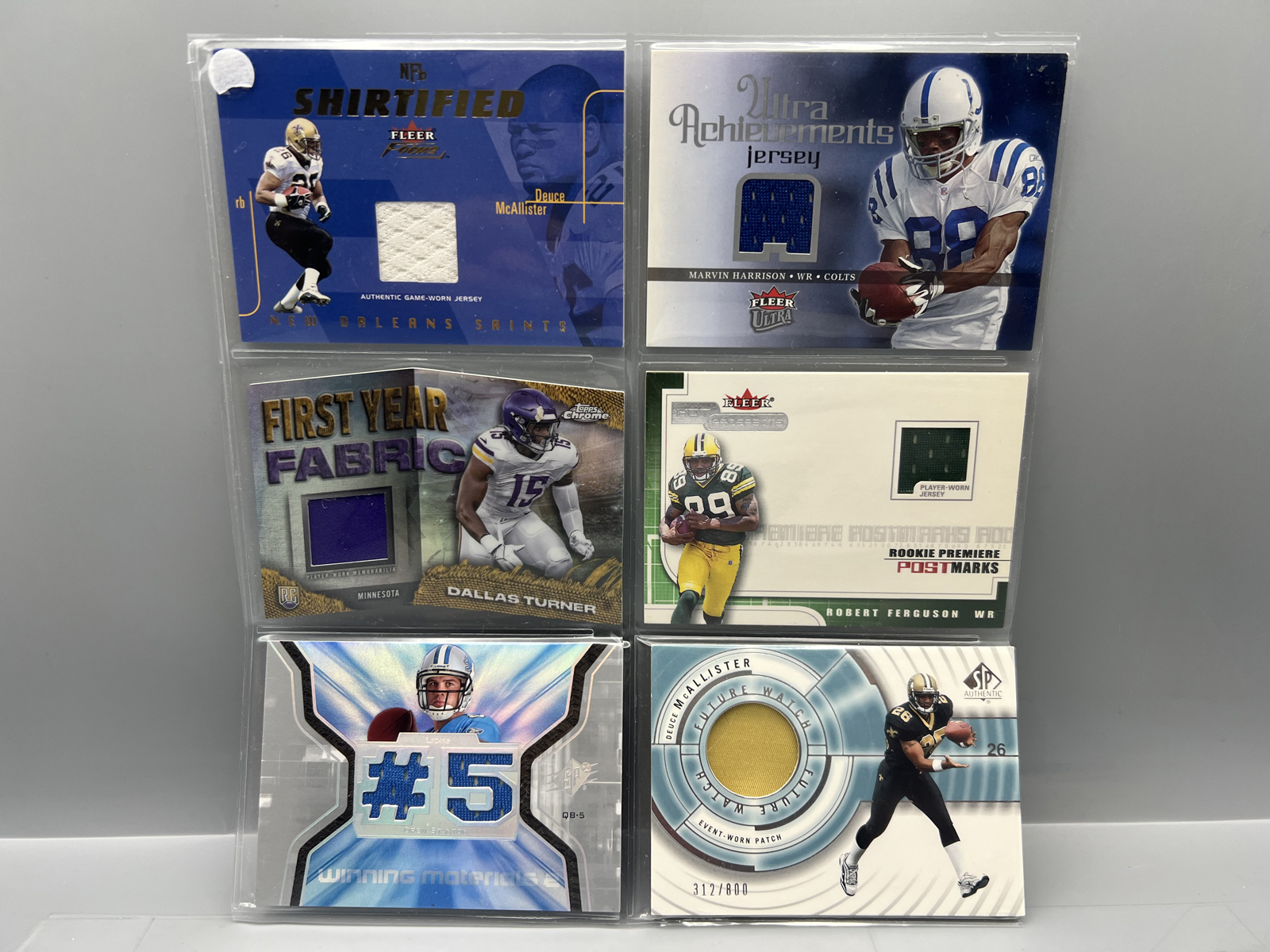 (6) Assorted Football Jersey Relic Cards W/ Marvin Harrison
