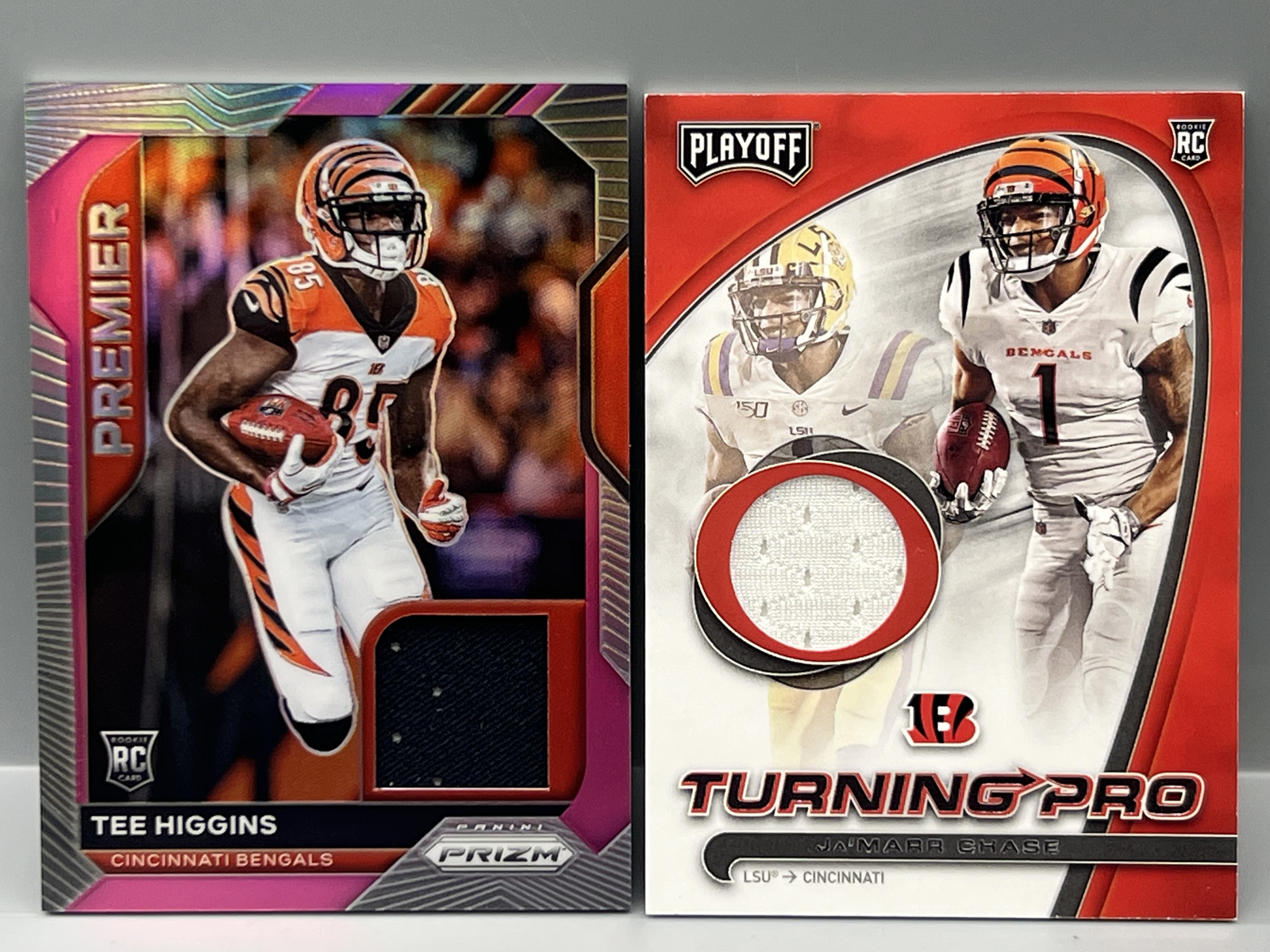 2020 Panini Prizm Tee Higgins Pink Premier RC Relic & 2021 Panini Playoff JaMarr Chase Turning Pro RC Relic