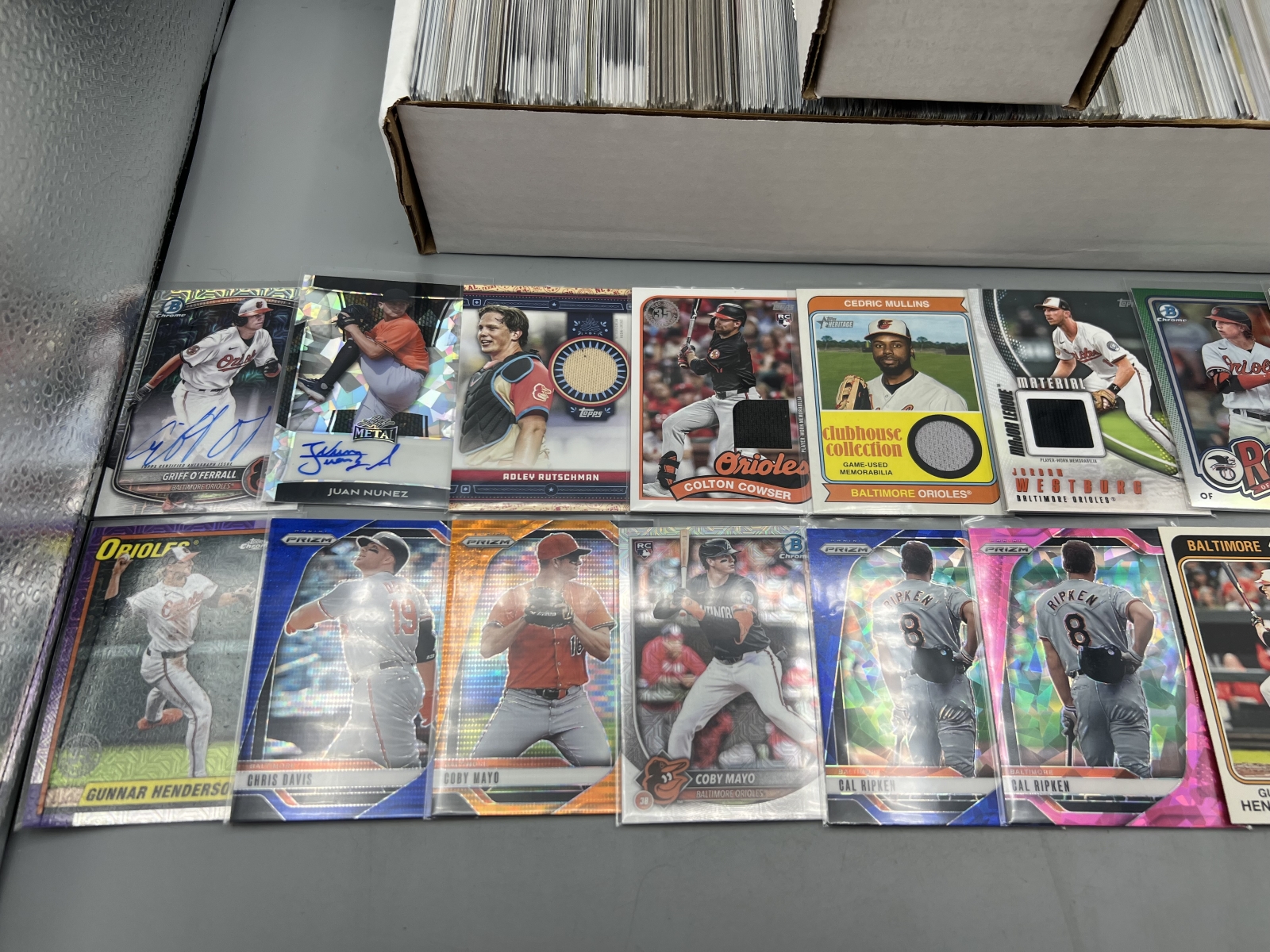 Box of Assorted Baltimore Orioles Baseball Cards W/ Many Stars, Rookies, Autos, Relics, Refractors, Parallels, & More