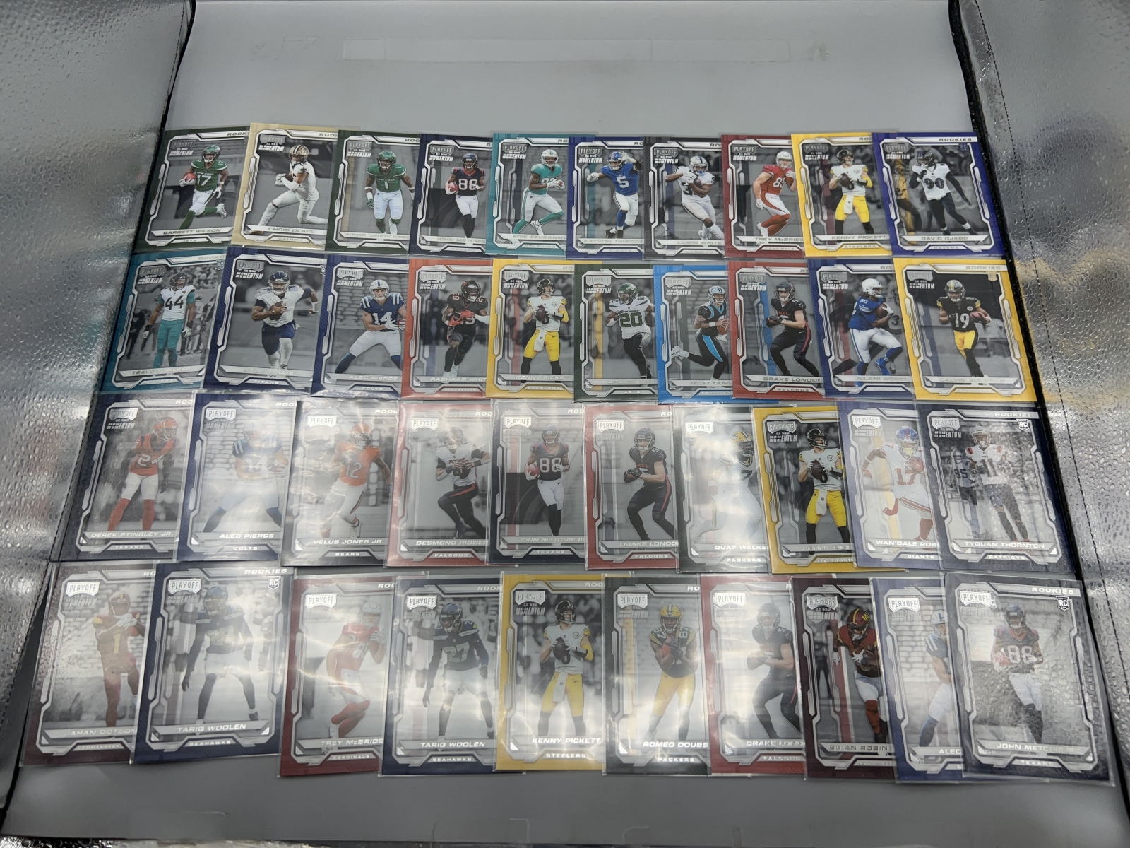 (40) 2022 Panini Playoff Momentum Football Rookies - Garrett Wilson, Drake London, Chris Olave, Tariq Woolen