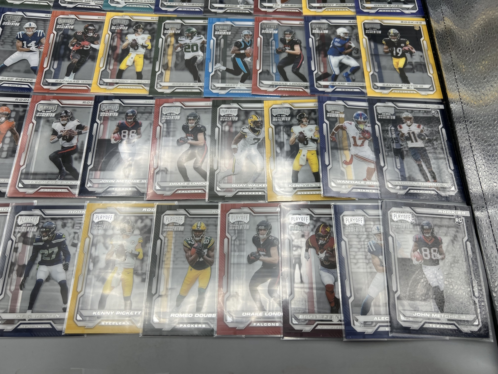 (40) 2022 Panini Playoff Momentum Football Rookies - Garrett Wilson, Drake London, Chris Olave, Tariq Woolen